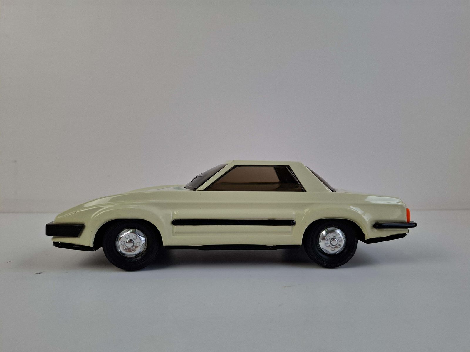 photo vintage 1970s Czechoslovak Ites Igra Norma Tin Friction Toy Car Mid Century Modern Space