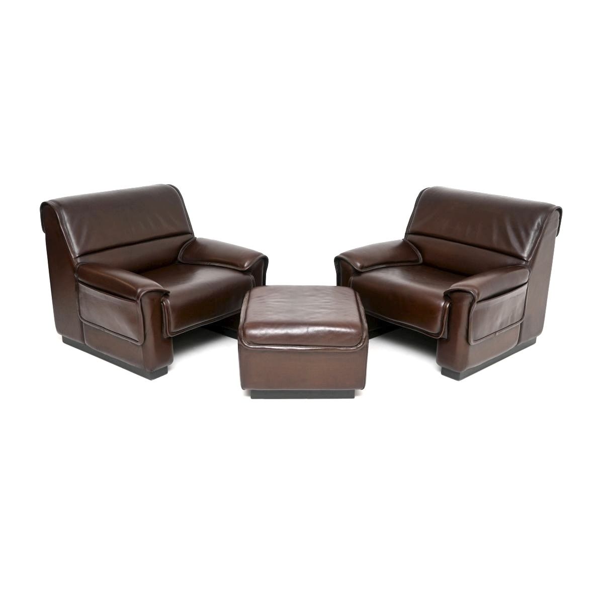 Pair Of Vintage Leather Armchairs And Stool By De Sede