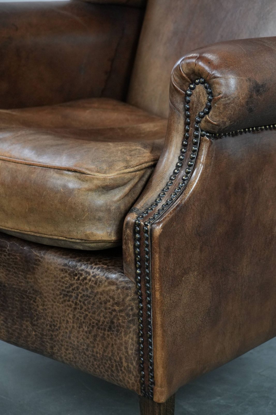 Furniture Warm, Cozy And Comfortable Vintage Sheepskin Armchair With Character photo