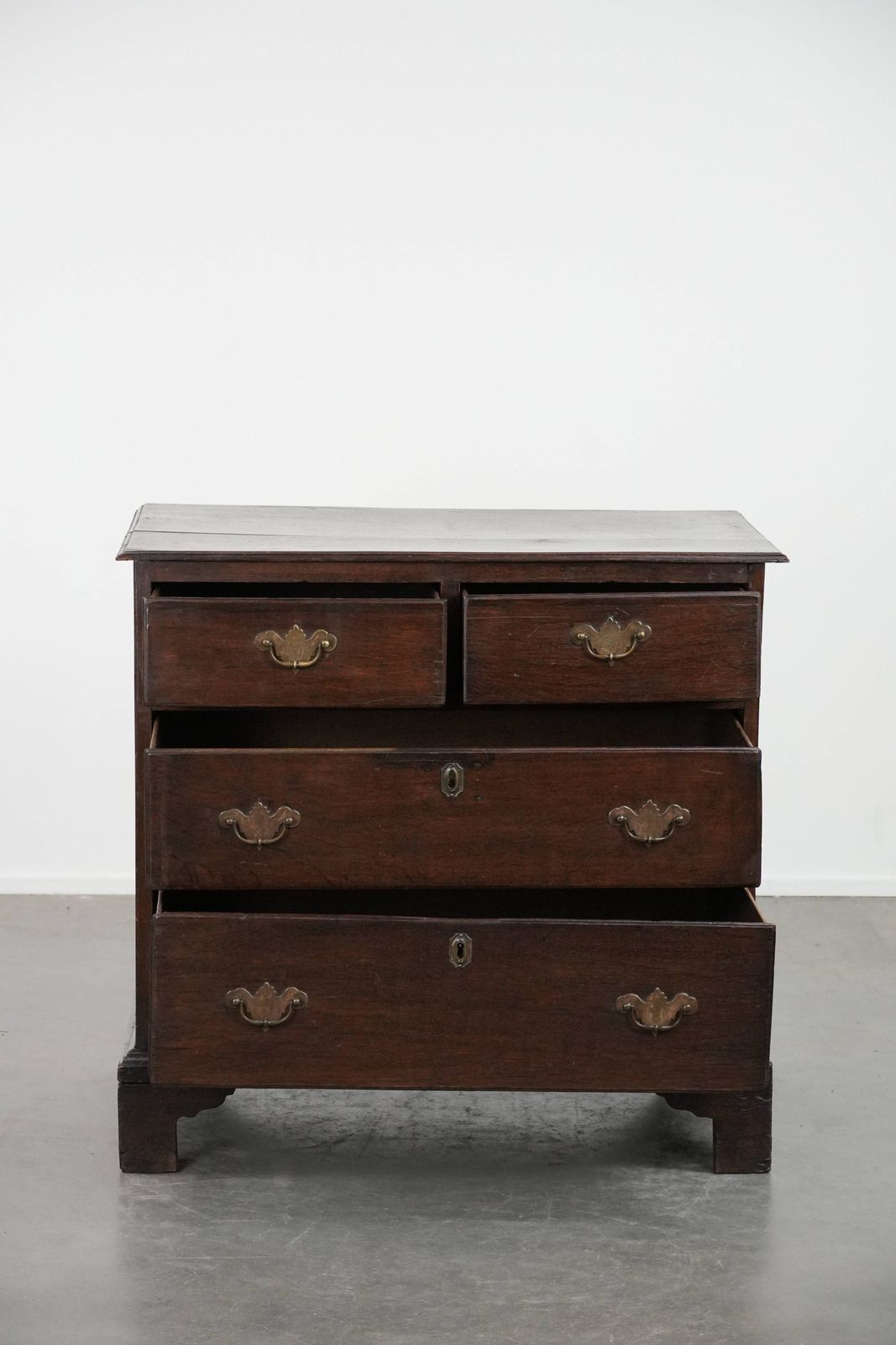 Subtle English Antique Oak Chest Of Drawers From The 18th Century In A Nice Modest Size With A Beautiful Patina photo for sale