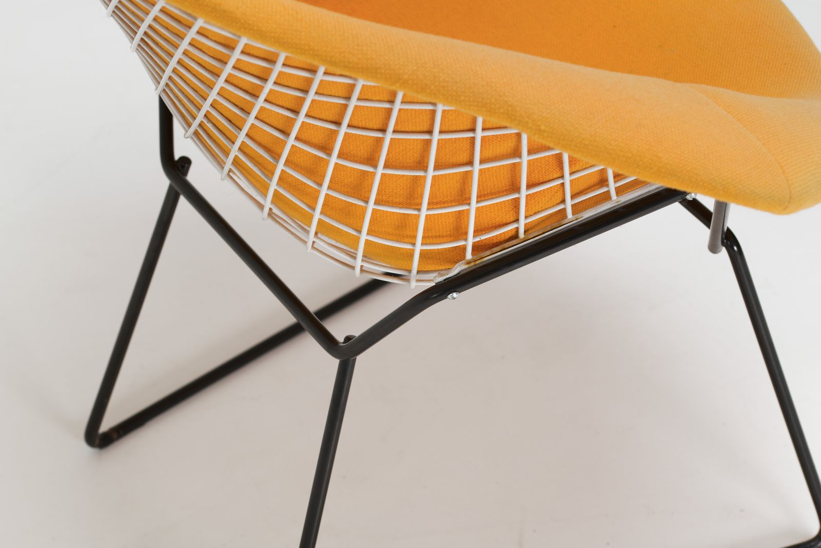 photo furniture Diamond Chair – Yellow Upholstery   Harry Bertoia