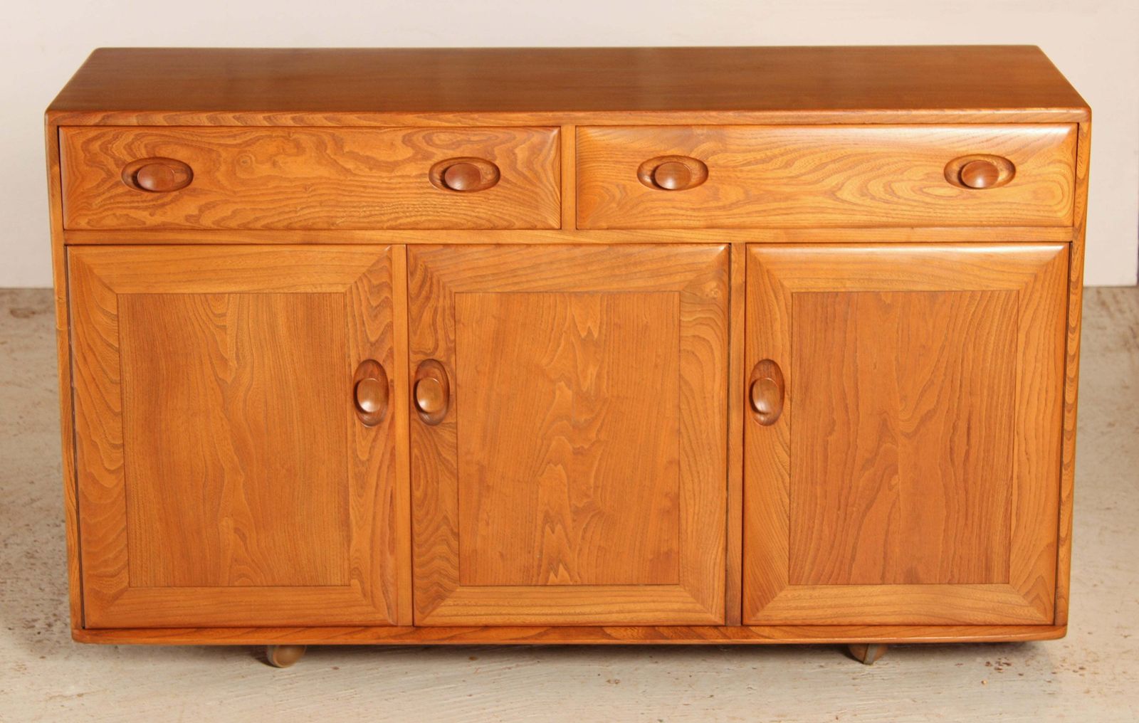 Mid Century Ercol Windsor Solid Elm Sideboard On Casters, Circa 1960s