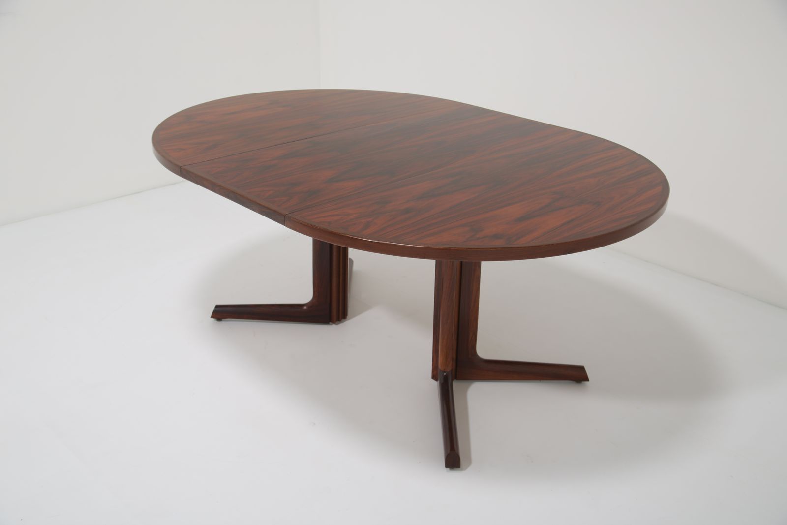 photo furniture Gudme Møbelfabrik Oval Extending Dining Table: In Highly Figured Rosewood On Pedestal Base, Denmark, 1960s.
