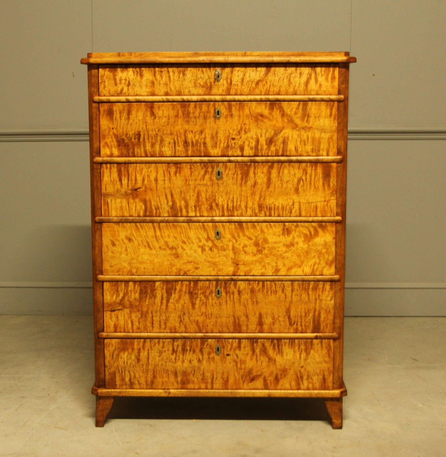 An Early 20th‑Century Swedish Birch Tall Chest Of Drawers