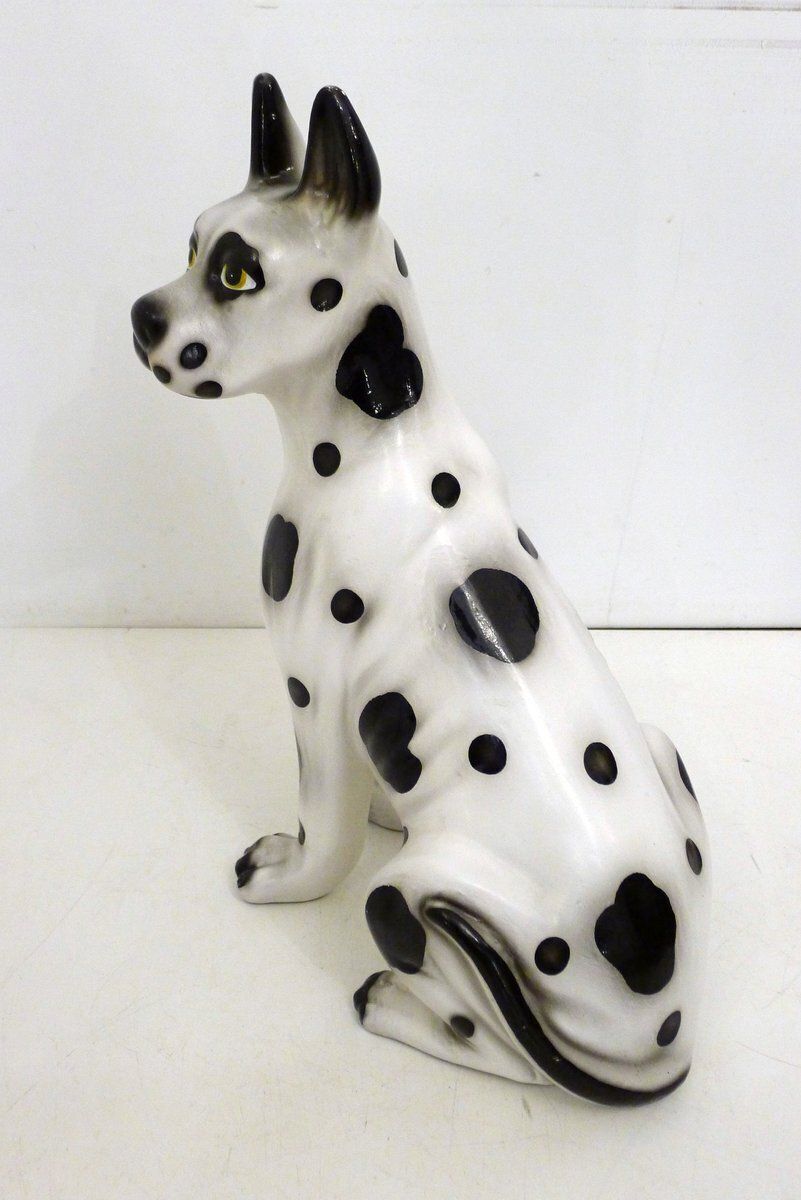 photo for sale Large Ceramic Sculpture Of A Seated Black And White Dog, 1970s