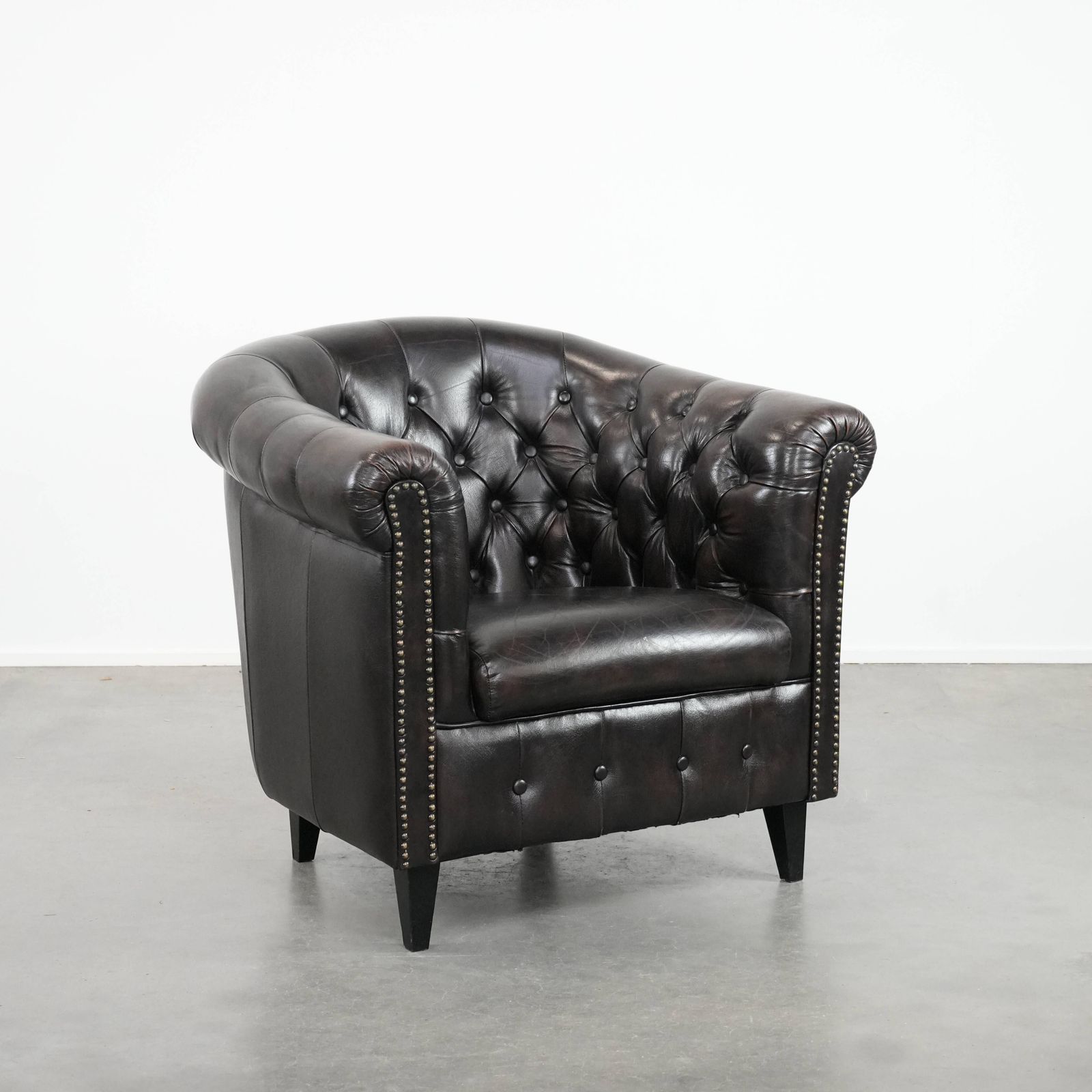 Dark Luxurious Cowhide Chesterfield Club Armchair In English Style, Finished With Decorative Nails