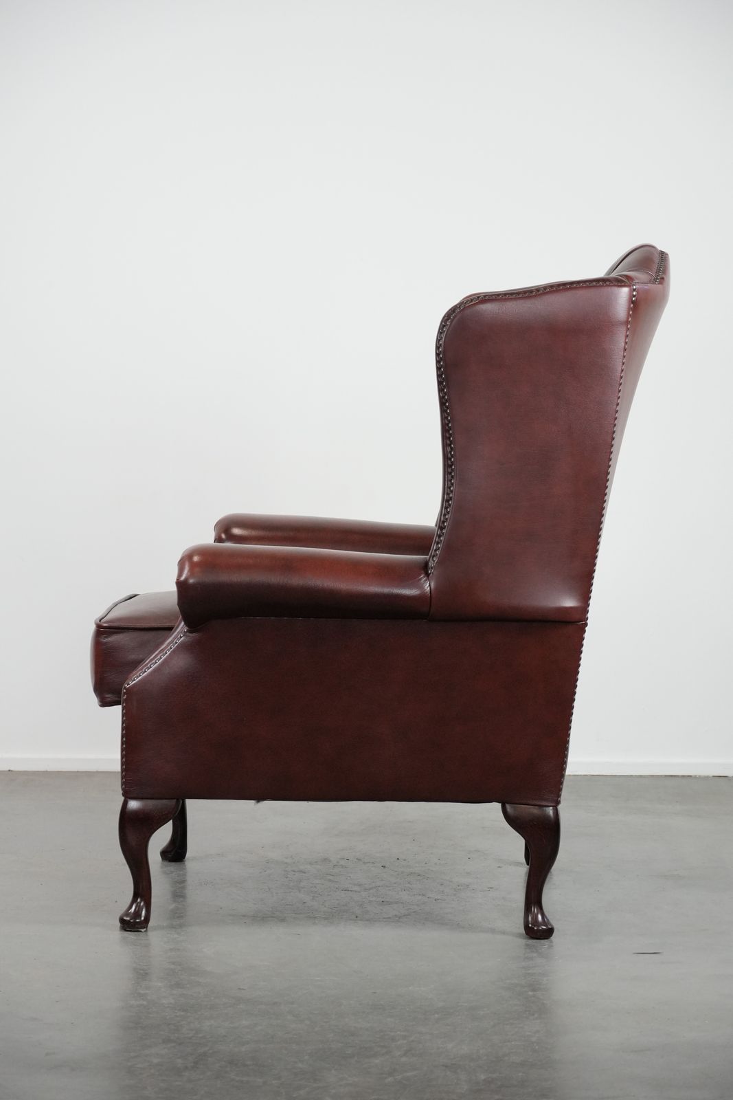 Classic And Elegant English Style Cowhide Chesterfield Wing Chair In A Beautiful, Luxurious Red Color photo 957.0