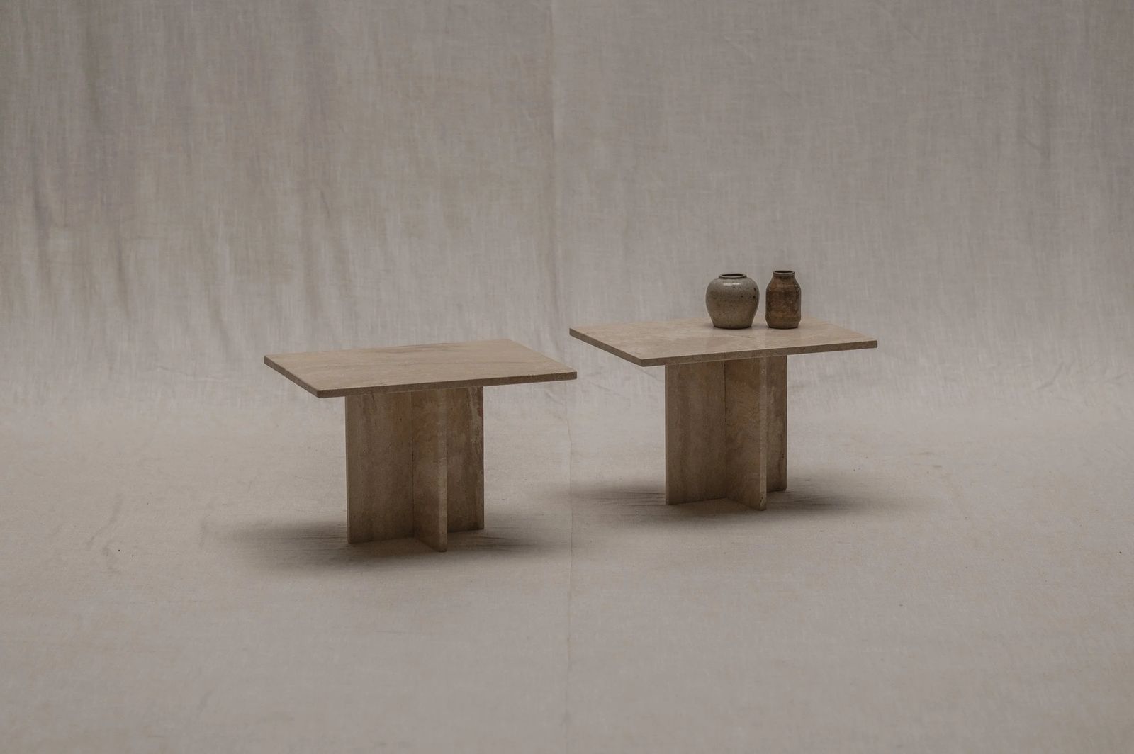 Set Of Two Italian Travertine Side Tables, 1970s.