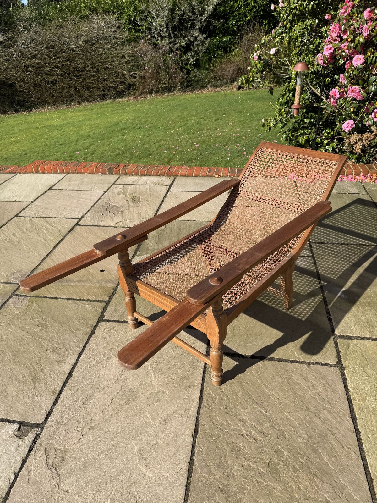 Late 19th Early 29th Century Teak Colonial Planter’s Chair With Rattan Weave