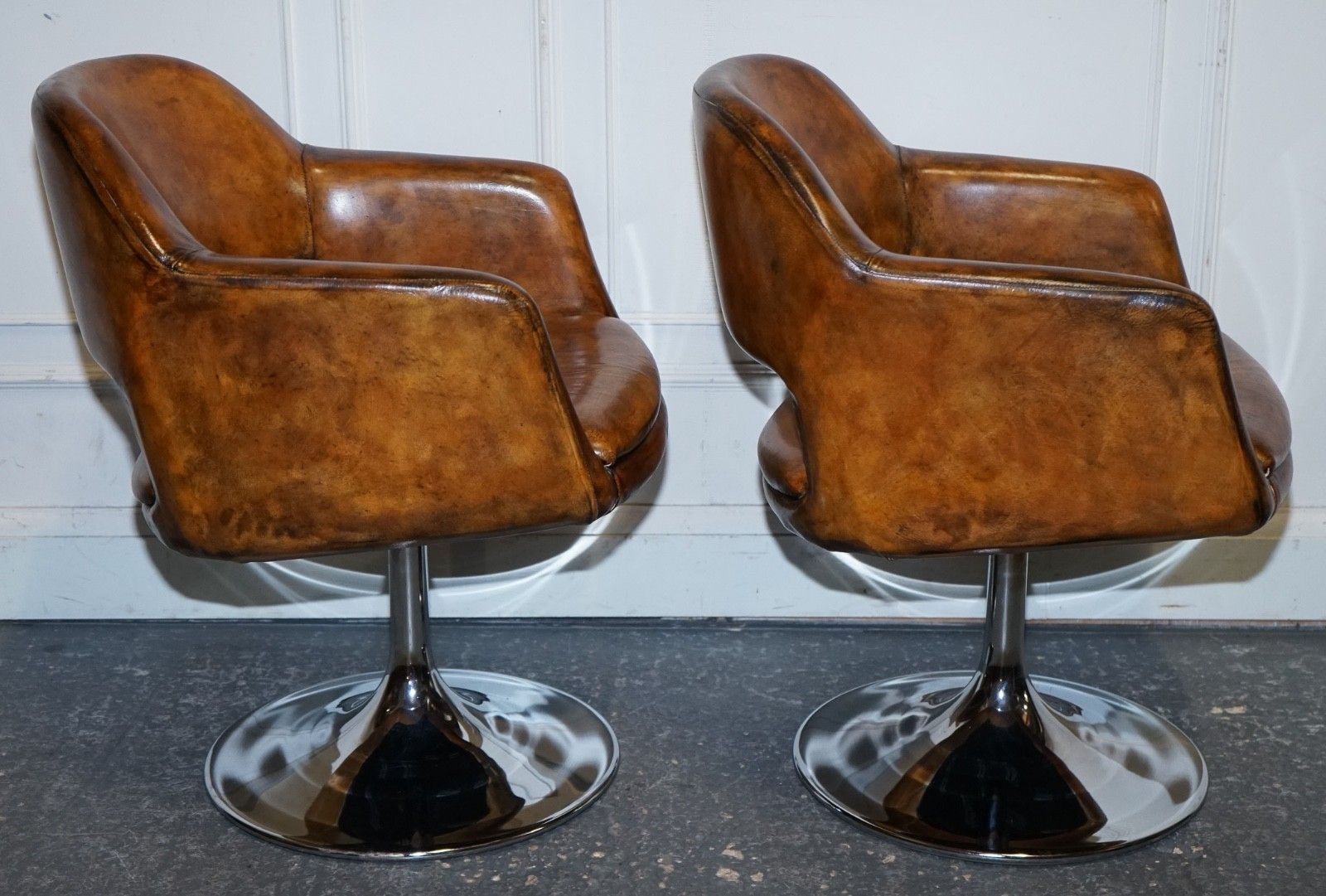 photo furniture Set Of Four Restored Hand Dyed Leather Largo Johanson Design Swivel Armchairs