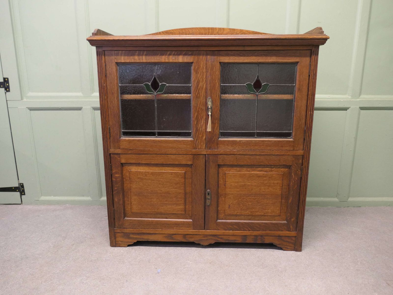Arts And Crafts Oak Stained Glass Bookcase. photo vinterior
