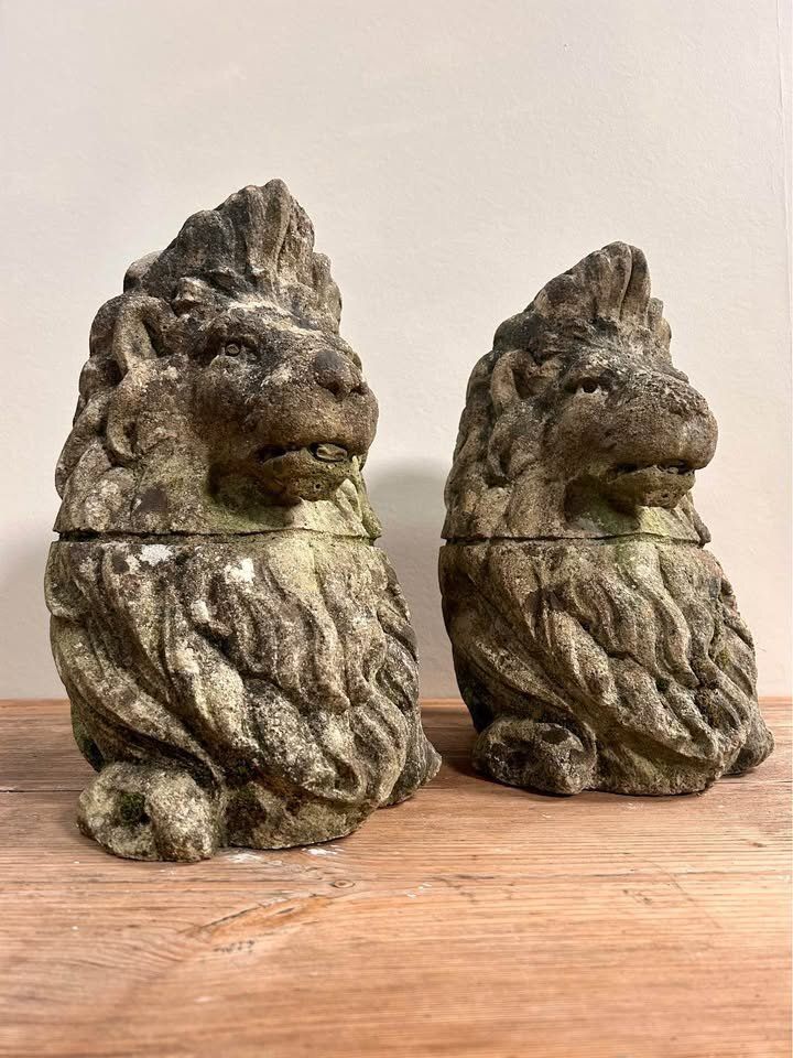 photo furniture Pair Of Carved Stone Lion Bust Statues