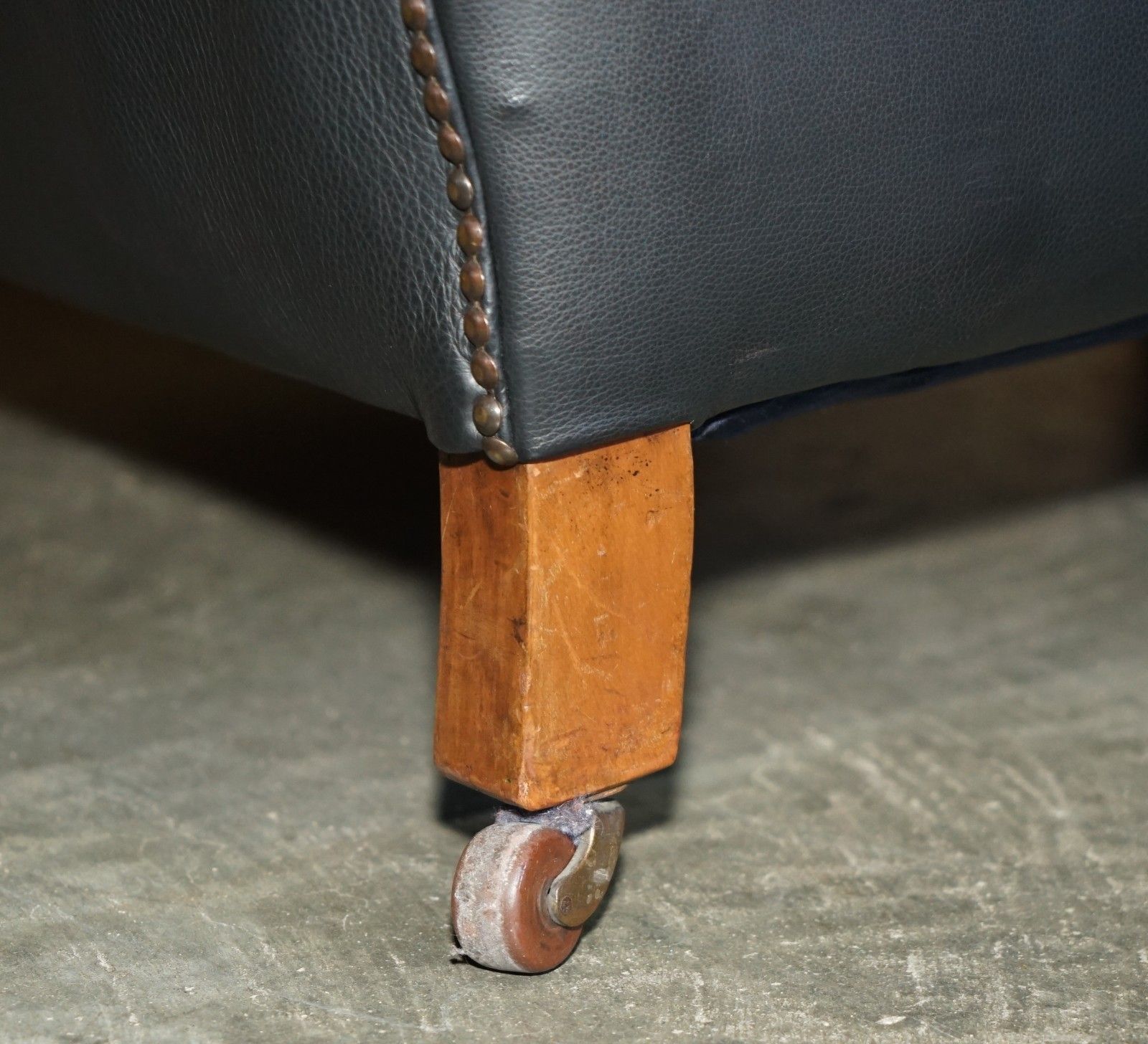 3950.0 Oversized Antique Victorian Black Leather Club Armchair Stamped Inside Back Leg photo