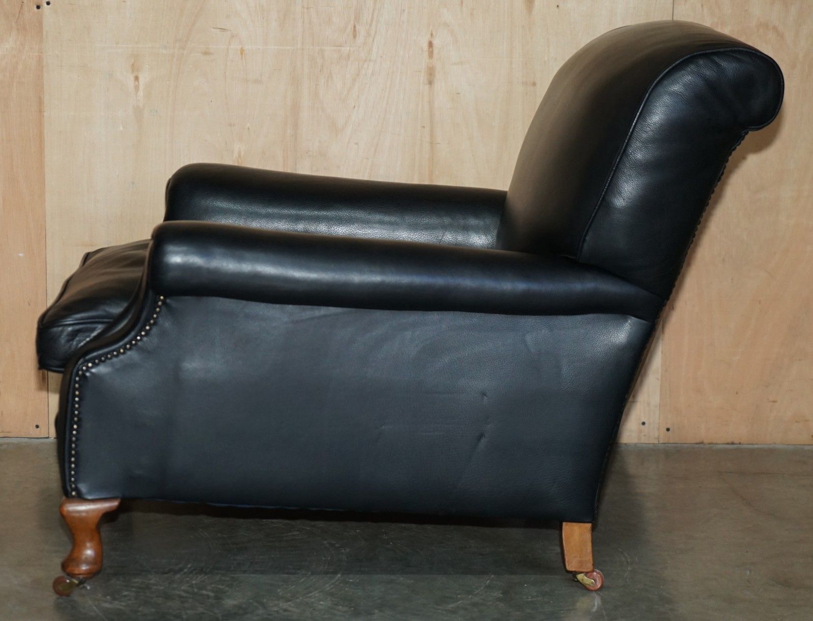 photo buy Oversized Antique Victorian Black Leather Club Armchair Stamped Inside Back Leg