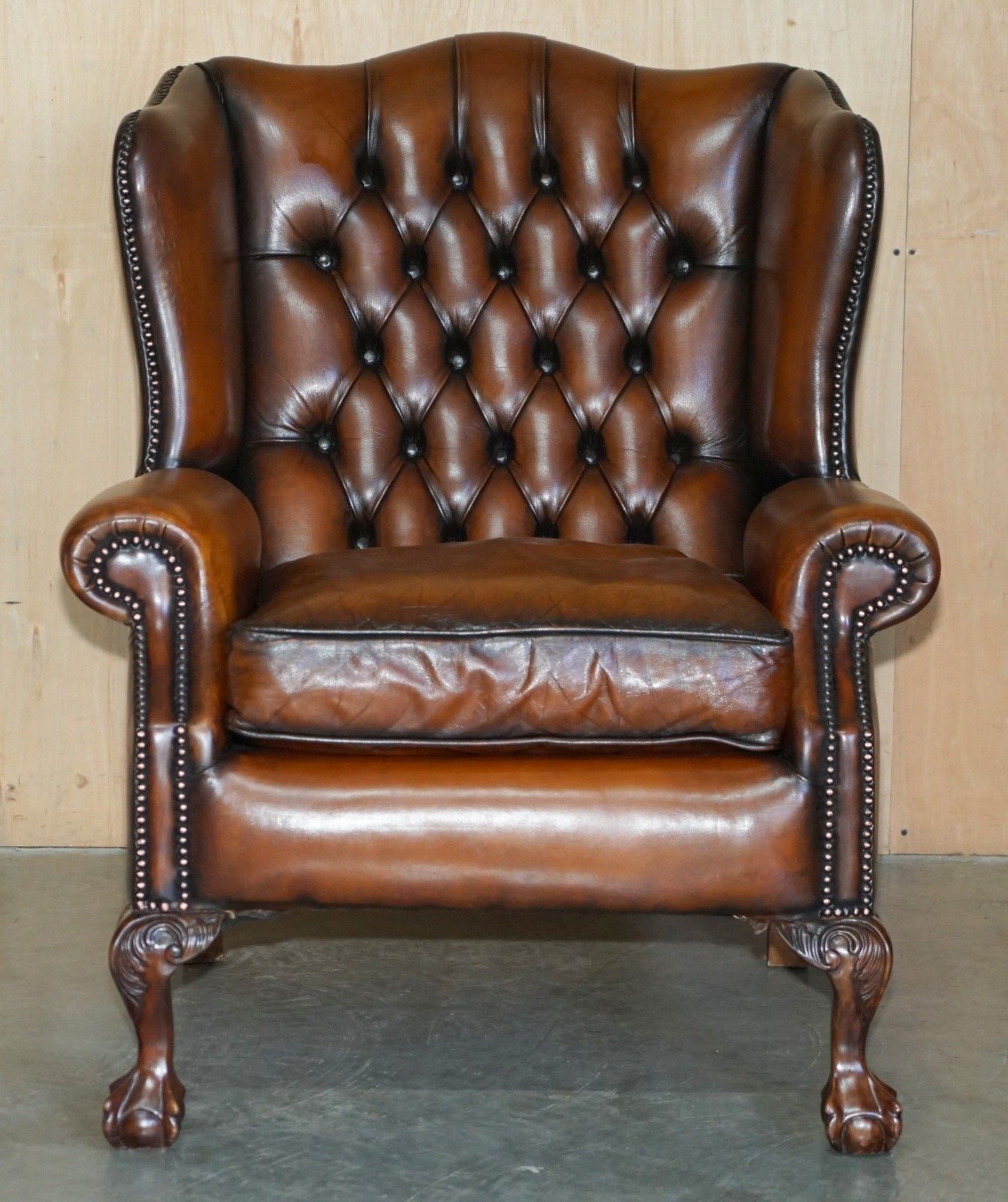 Restored Claw & Ball Feet Chesterfield Tufted Brown Leather Wingback Armchair photo for sale