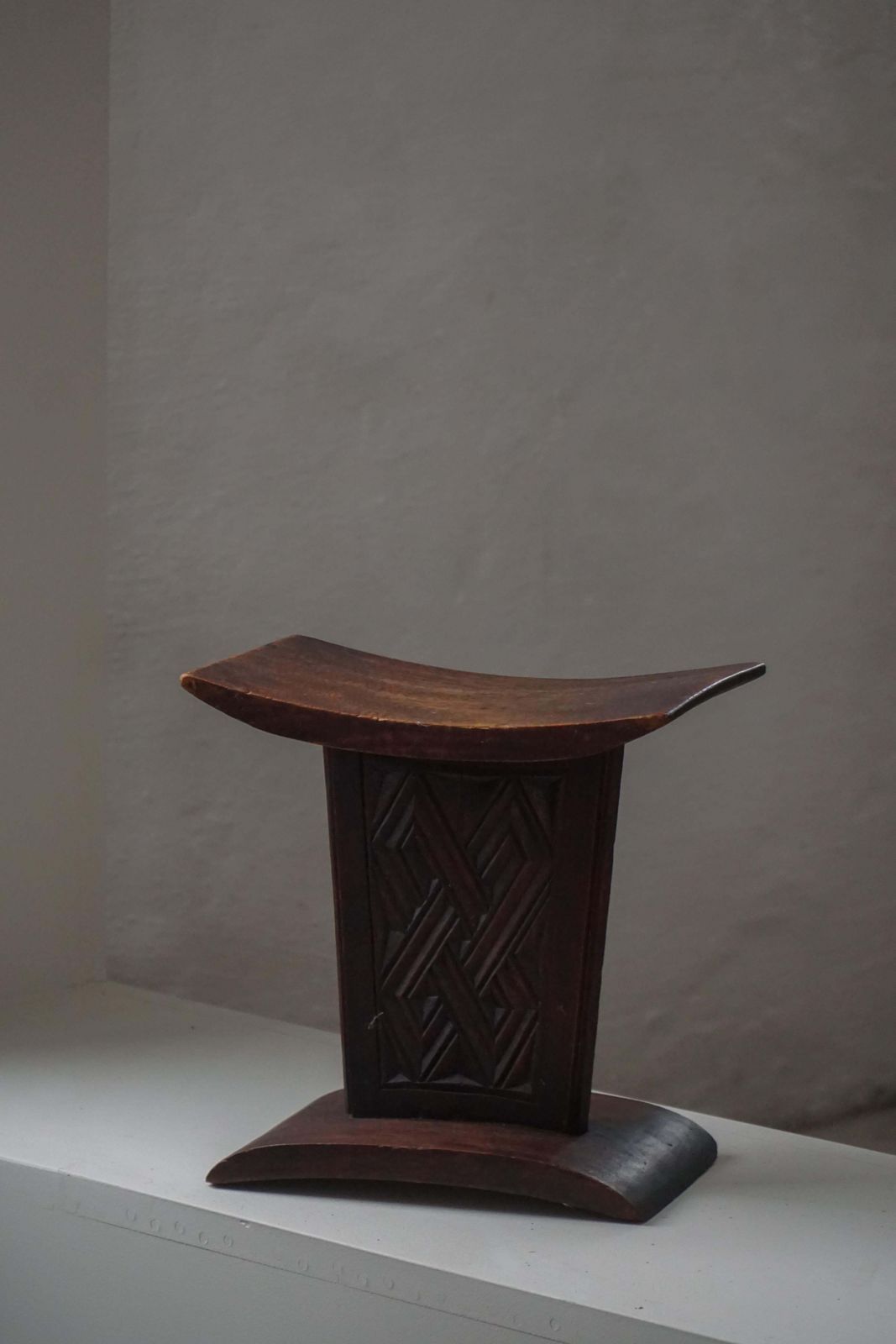 African Sculptural Hardwood Stool, Curved Seat And Architectural Base, 1970s photo Furniture