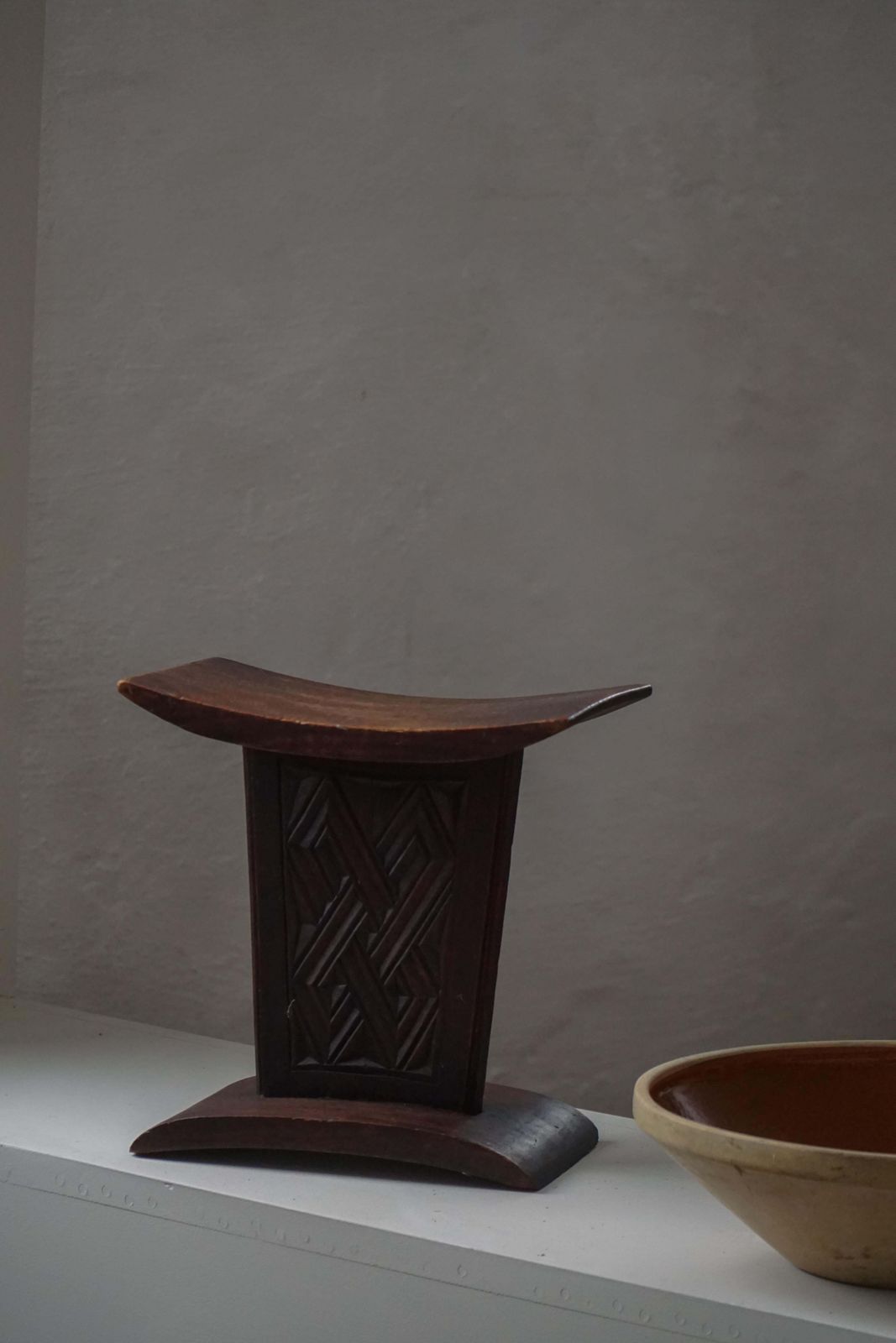 509.0 African Sculptural Hardwood Stool, Curved Seat And Architectural Base, 1970s photo