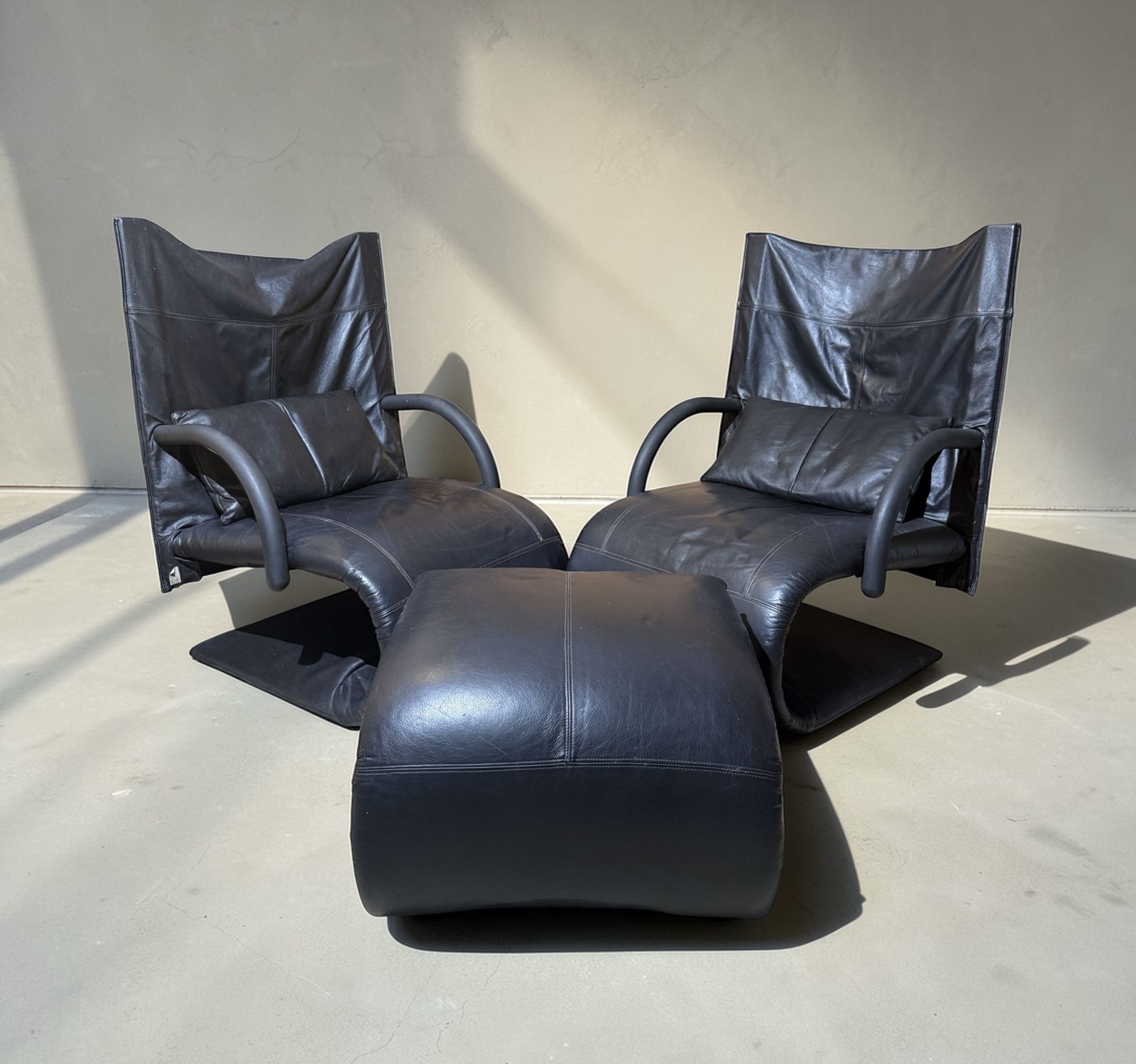Pair Of Ligne Rosset Zen Leather Chairs – With Ottoman.