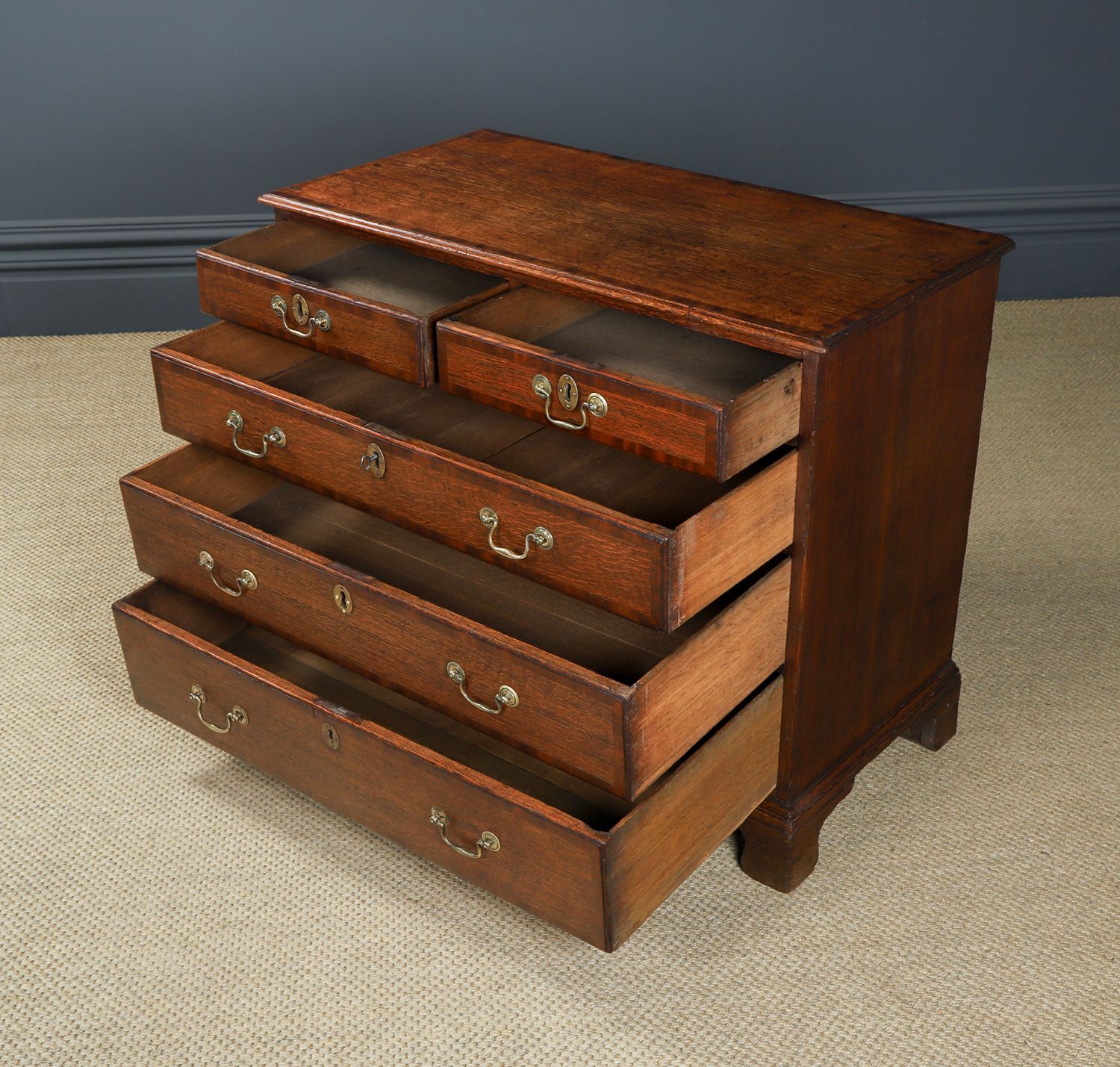 photo buy Small Antique English Oak & Mahogany Cross Banded Bachelor’s Chest Of Drawers (Circa 1780)
