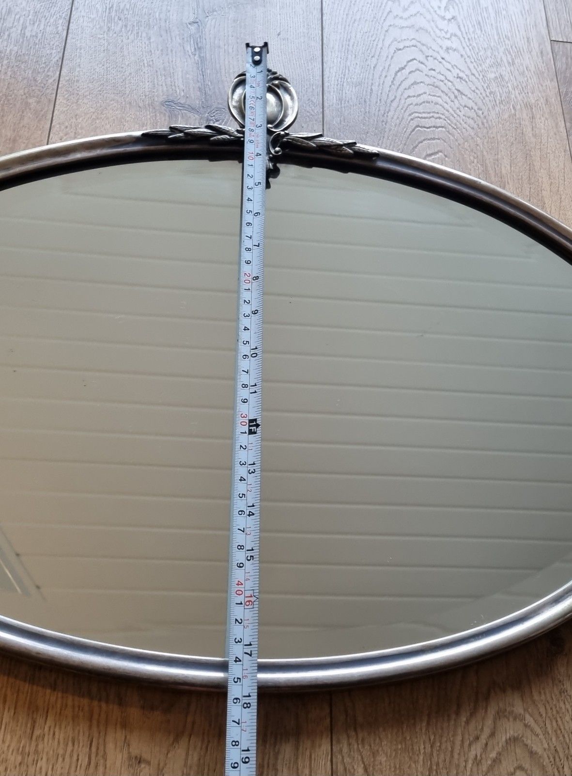 photo buy Early 20th Century Oval Silver Tone Metal Mirror Ornate Crest Bevelled Edge