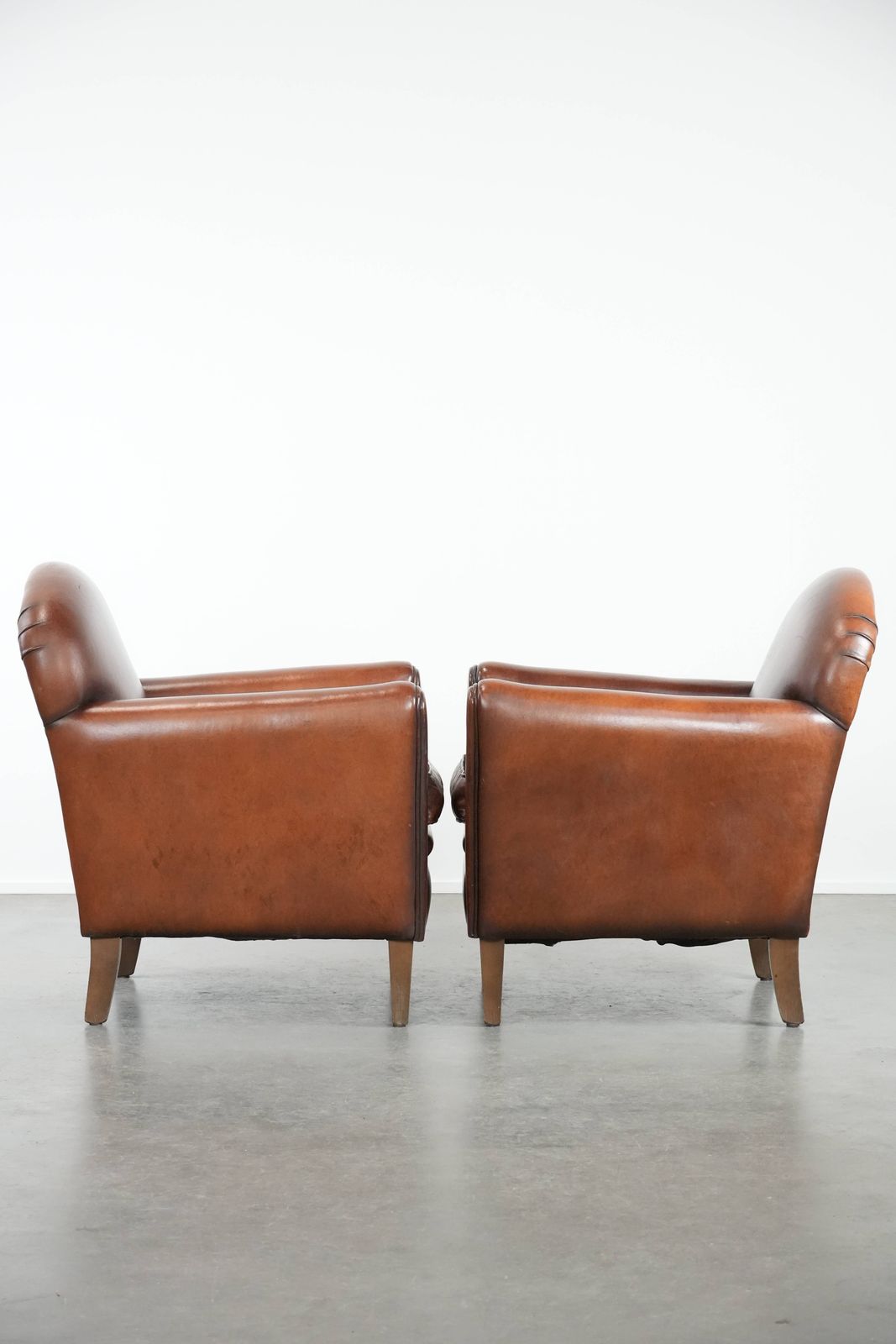 Set Of 2 Beautifully Shaped Sheep Leather Art Deco Design Armchairs With Timeless And Warm Colors photo furniture