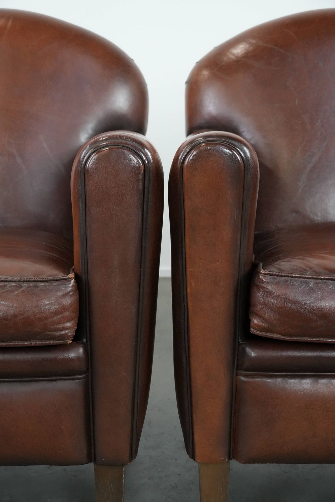 photo for sale Set Of 2 Beautifully Shaped Sheep Leather Art Deco Design Armchairs With Timeless And Warm Colors