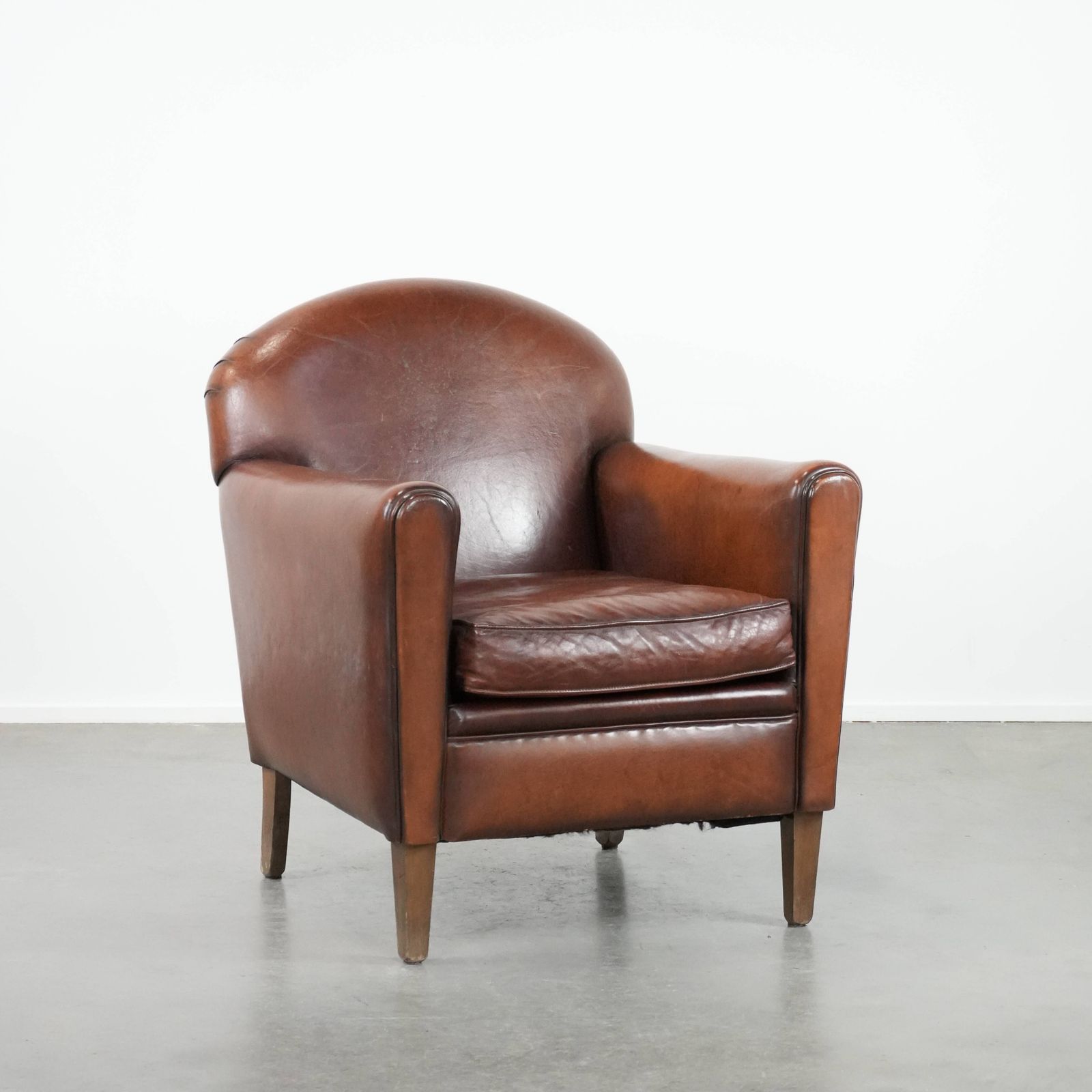 Armchair Made Of Beautifully Shaped Sheep Leather In Art Deco Design With Timeless And Warm Colors