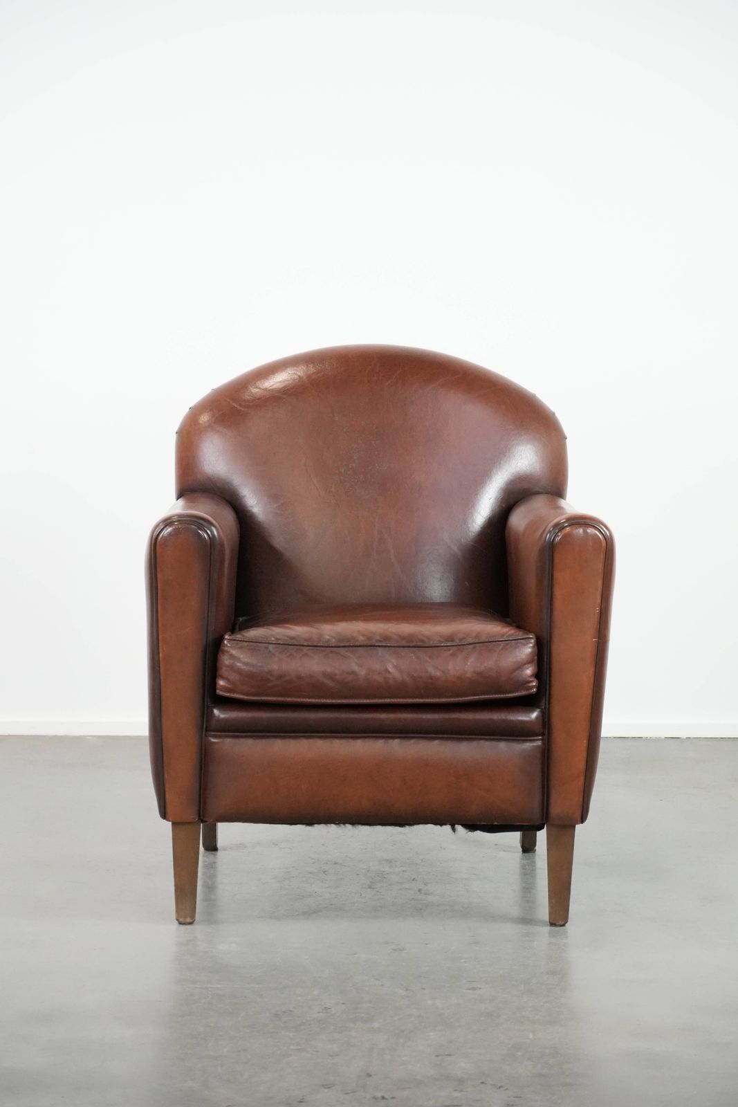 Armchair Made Of Beautifully Shaped Sheep Leather In Art Deco Design With Timeless And Warm Colors photo furniture