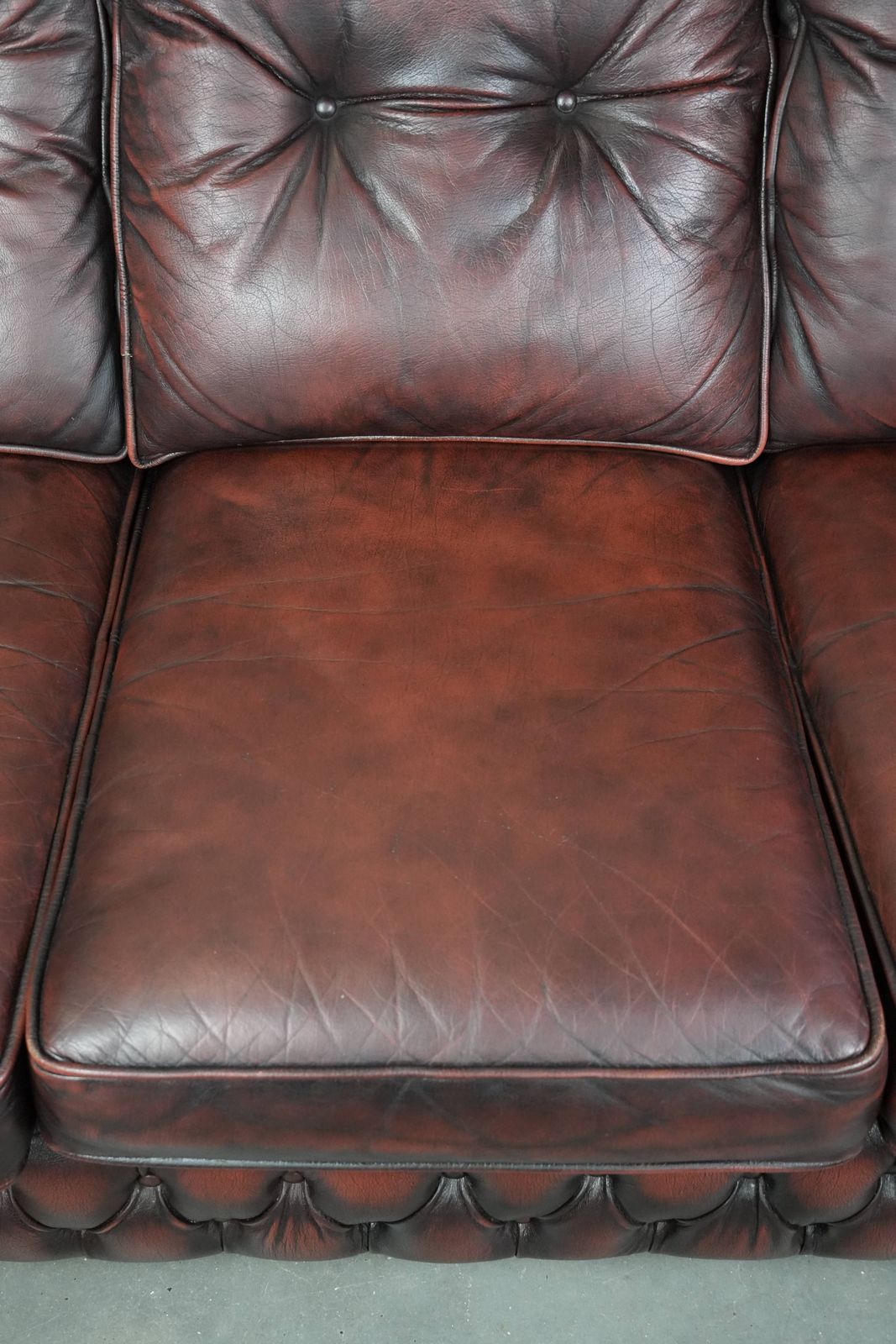 Beautiful Red 2.5 Seater Chesterfield Sofa On English Style Wheels Made Of Thick Cow Leather photo vinterior