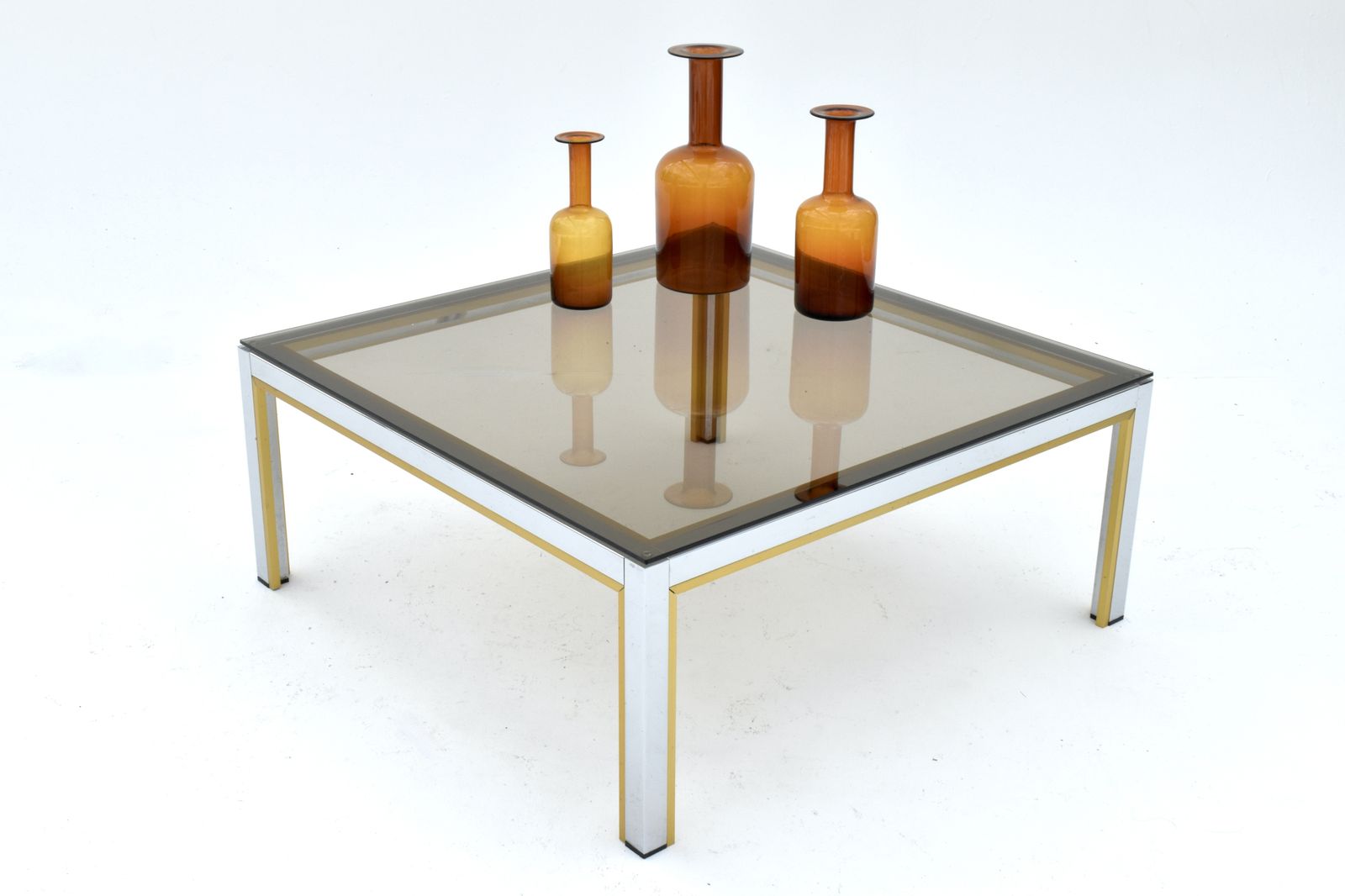 photo for sale 1970s Italian Renato Zevi Chrome, Brass & Smoked Glass Coffee Table
