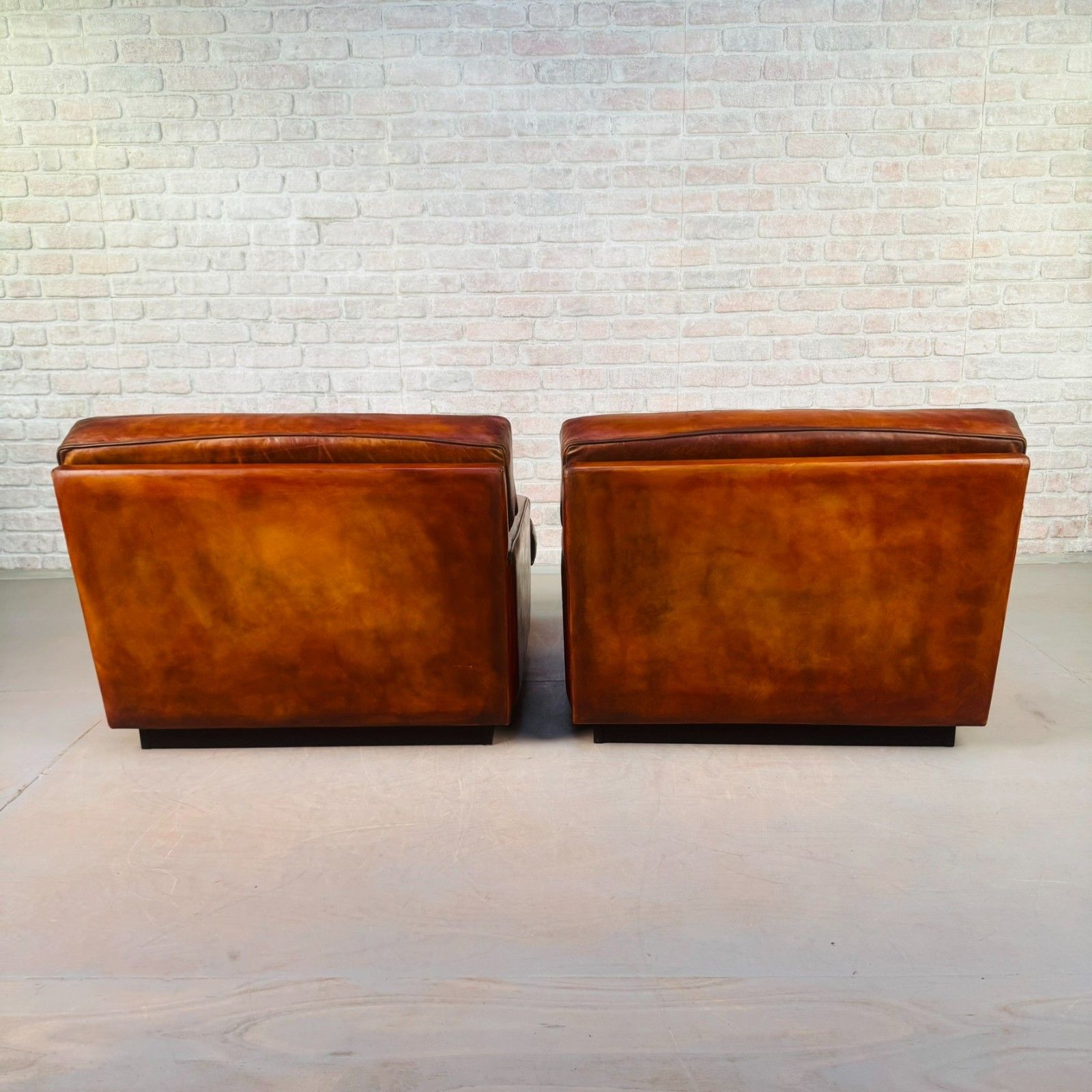 photo furniture Pair Of Arne Norell Swedish Tan Leather Lounge Chairs