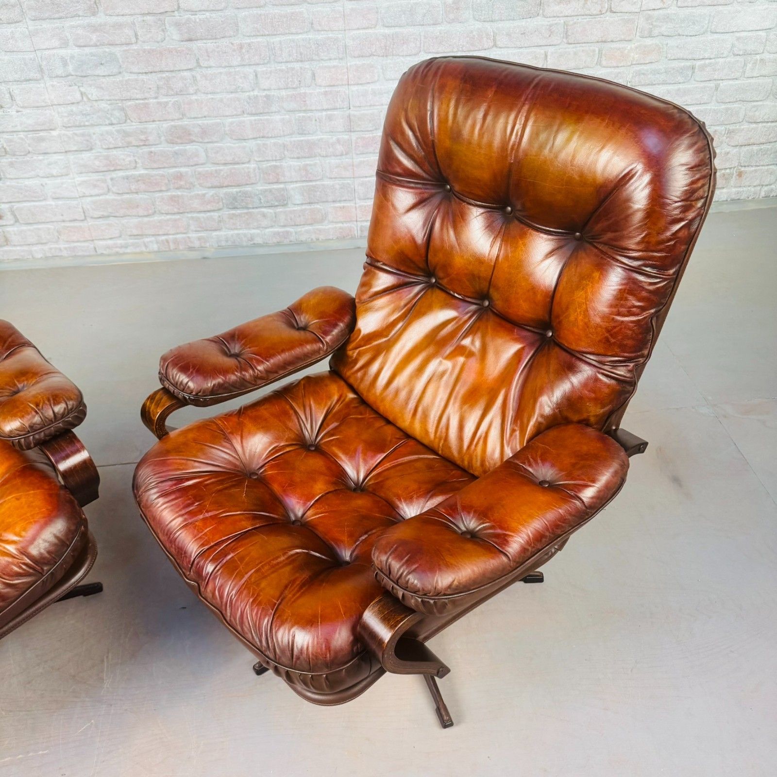 photo buy Pair Of Vintage Danish Tan Leather Swivel Chairs  Stylish
