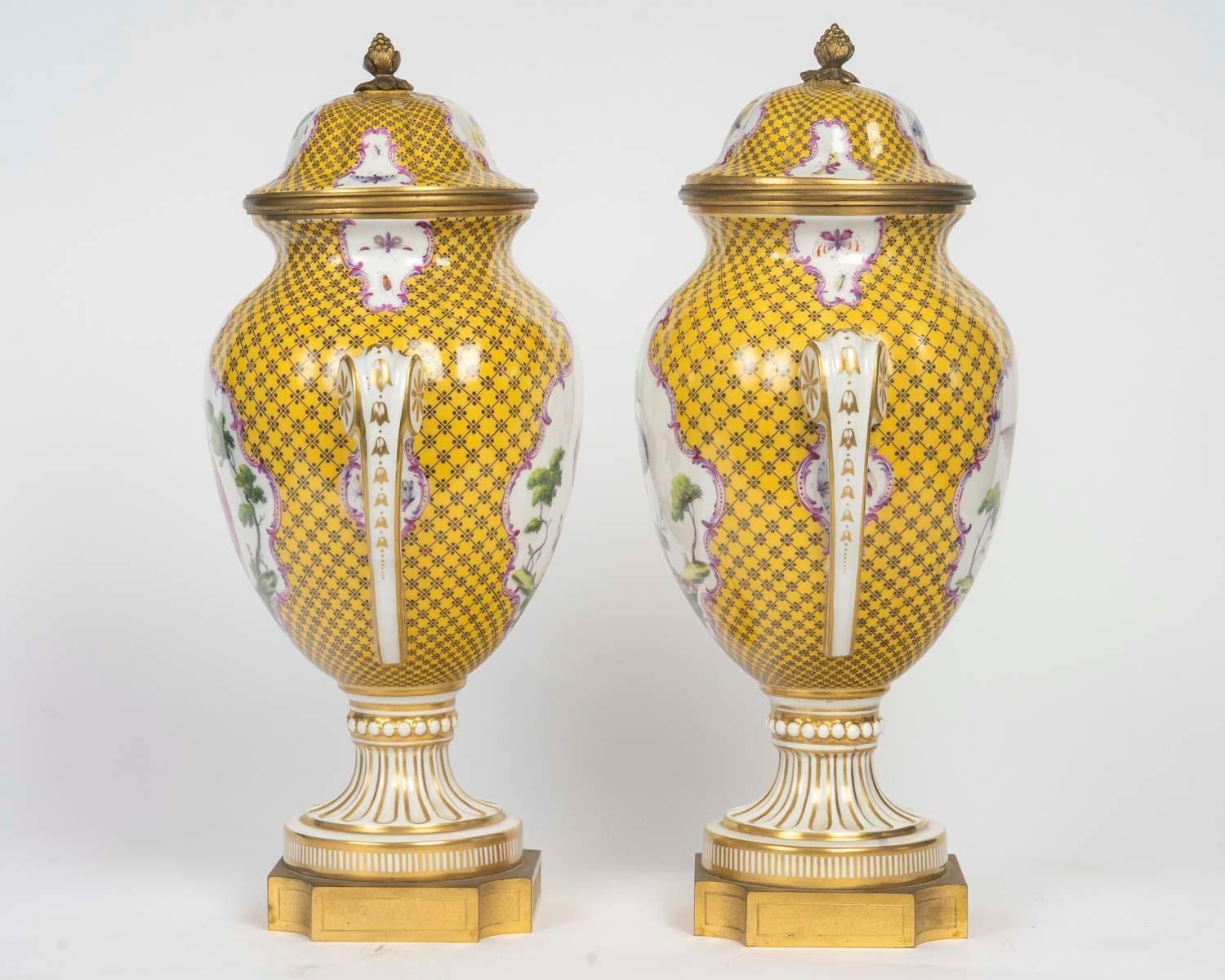Pair Of Louis XVI Style Porcelain And Gilded Bronze Covered Vases photo vinterior