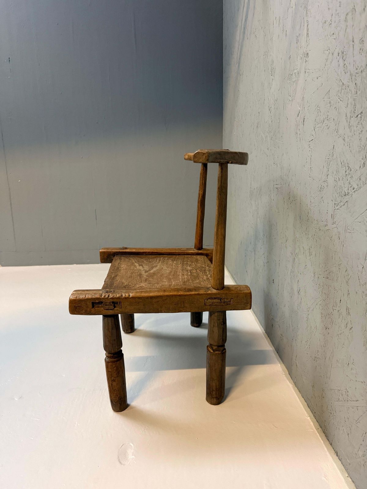 photo furniture Hand Carved African Baule Tribal Chair, Ivory Coast, Early 20th Century