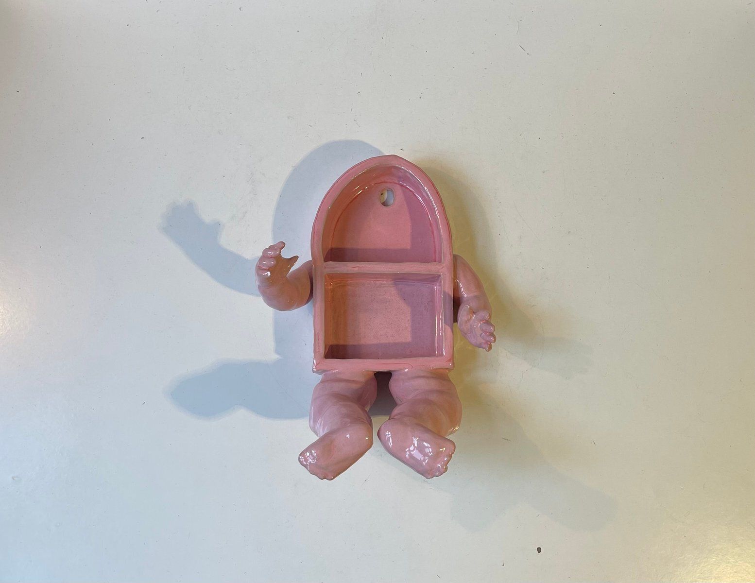 Surrealist Baby Body Vanity Shelf In Pink Glazed Ceramic, 2000s photo furniture