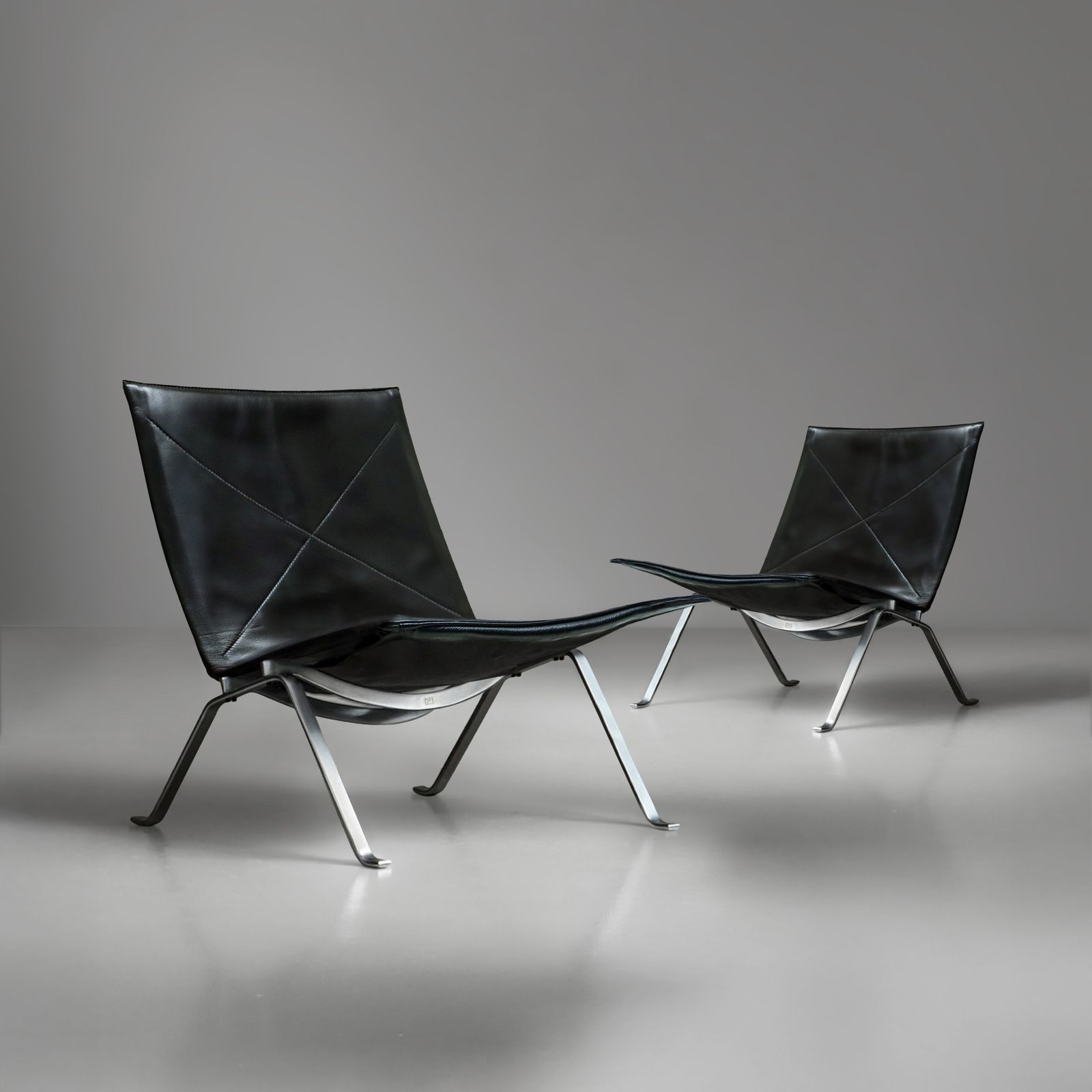 Pair Of Black Leather And Polished Steel Danish Mid Century Poul Kjaerholm Pk22 Lounge Chairs For E. Kold Christensen 1960s. photo furniture
