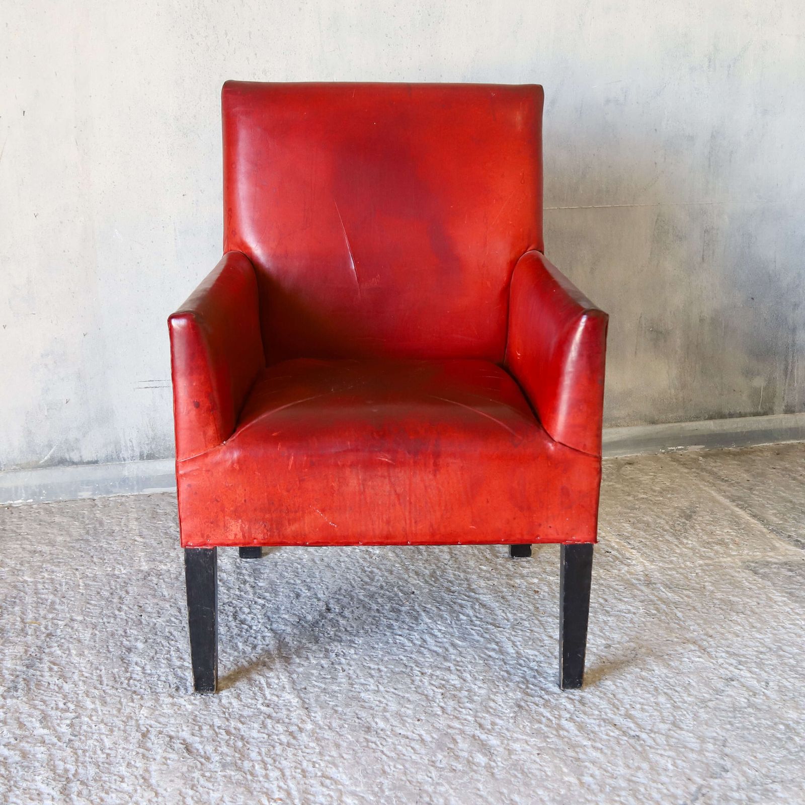 Mid 20th Century Red Leather Armchair On Ebonised Legs – Vintage Character & Comfort photo furniture