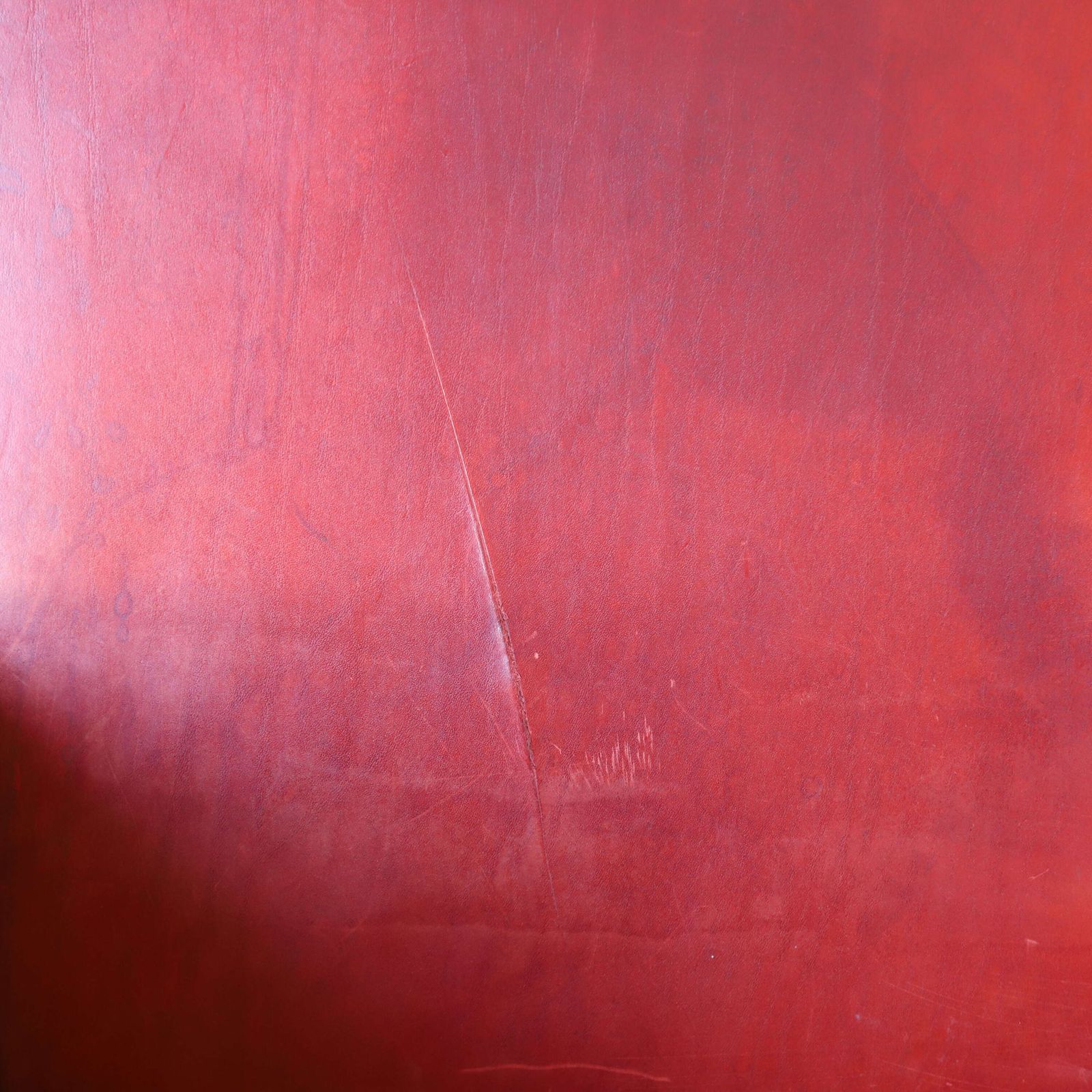 Mid 20th Century Red Leather Armchair On Ebonised Legs – Vintage Character & Comfort photo vinterior