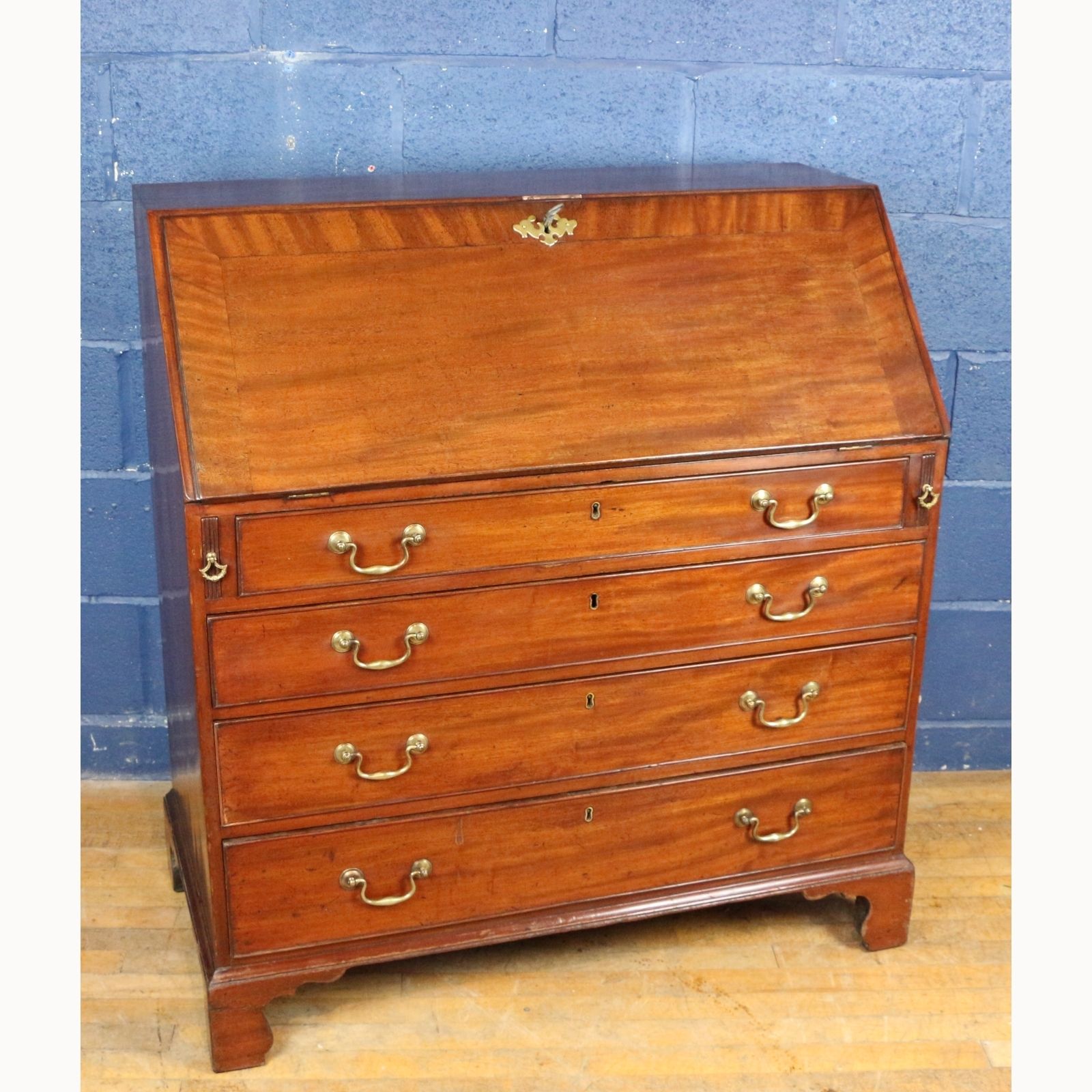 A Georgian Mahogany Fall Front Bureau With Fitted Interior Raised On Bracket Feet photo furniture