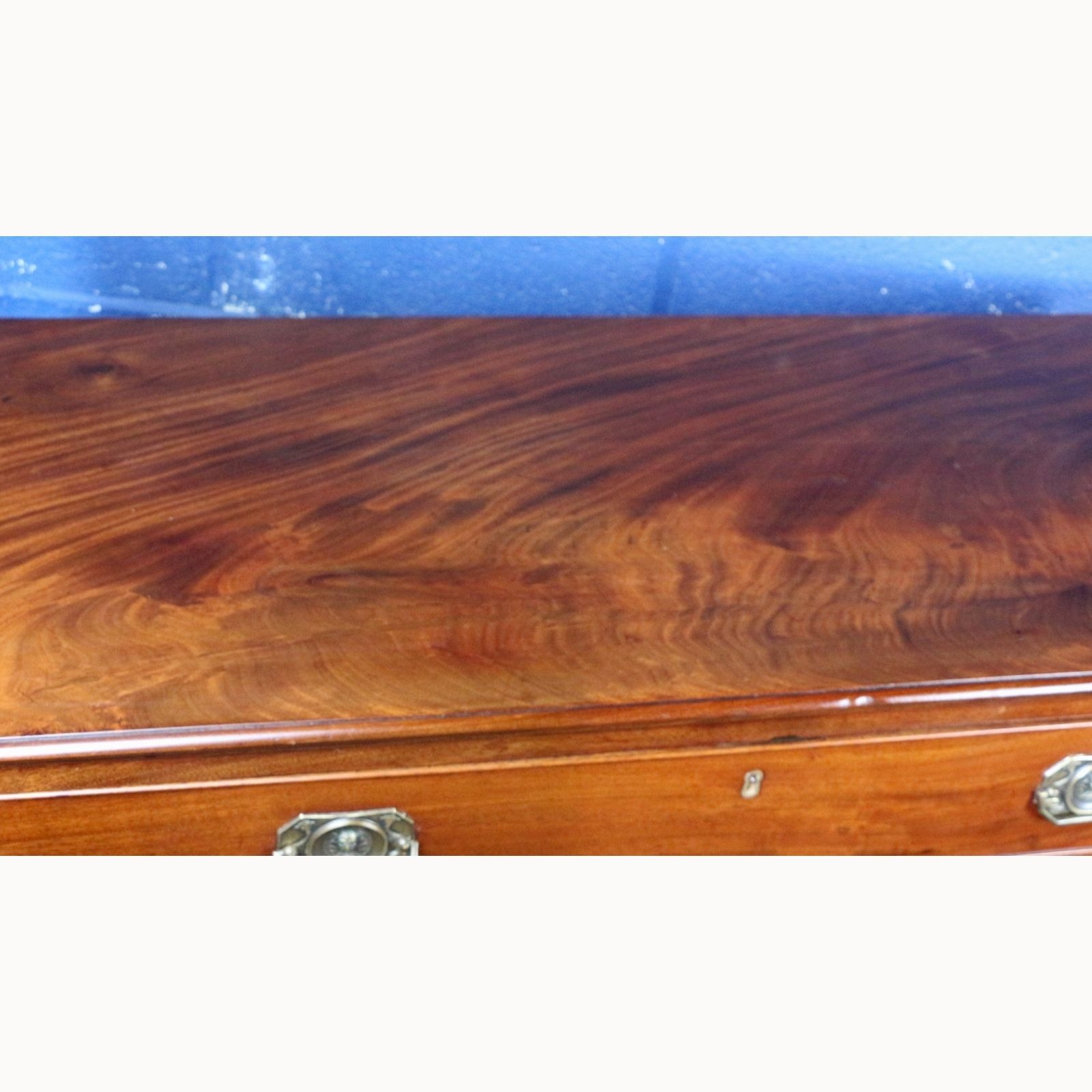 A Quality Georgian Mahogany Graduated Chest Of Four Drawers Raised On Bracket Feet photo for sale