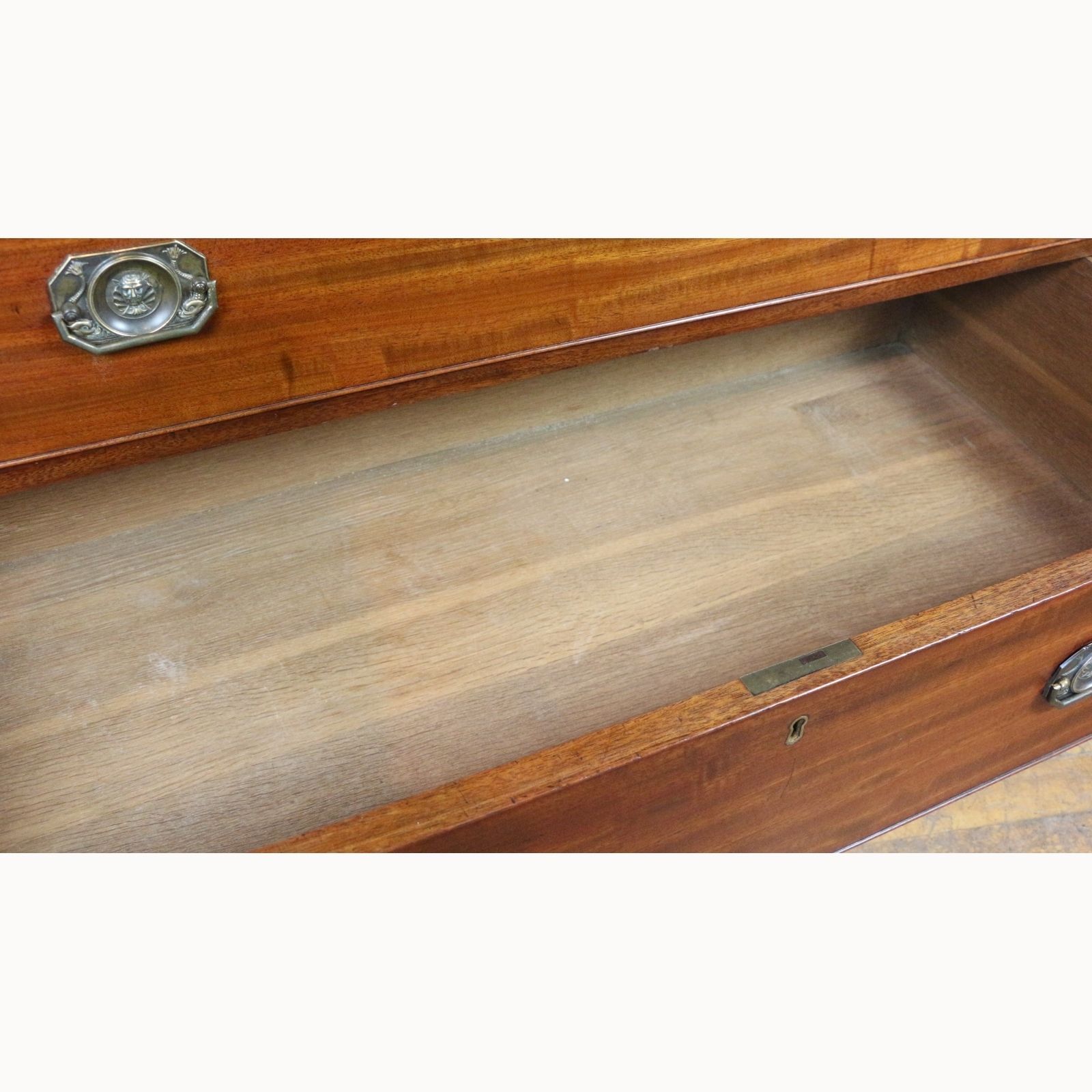 A Quality Georgian Mahogany Graduated Chest Of Four Drawers Raised On Bracket Feet photo buy