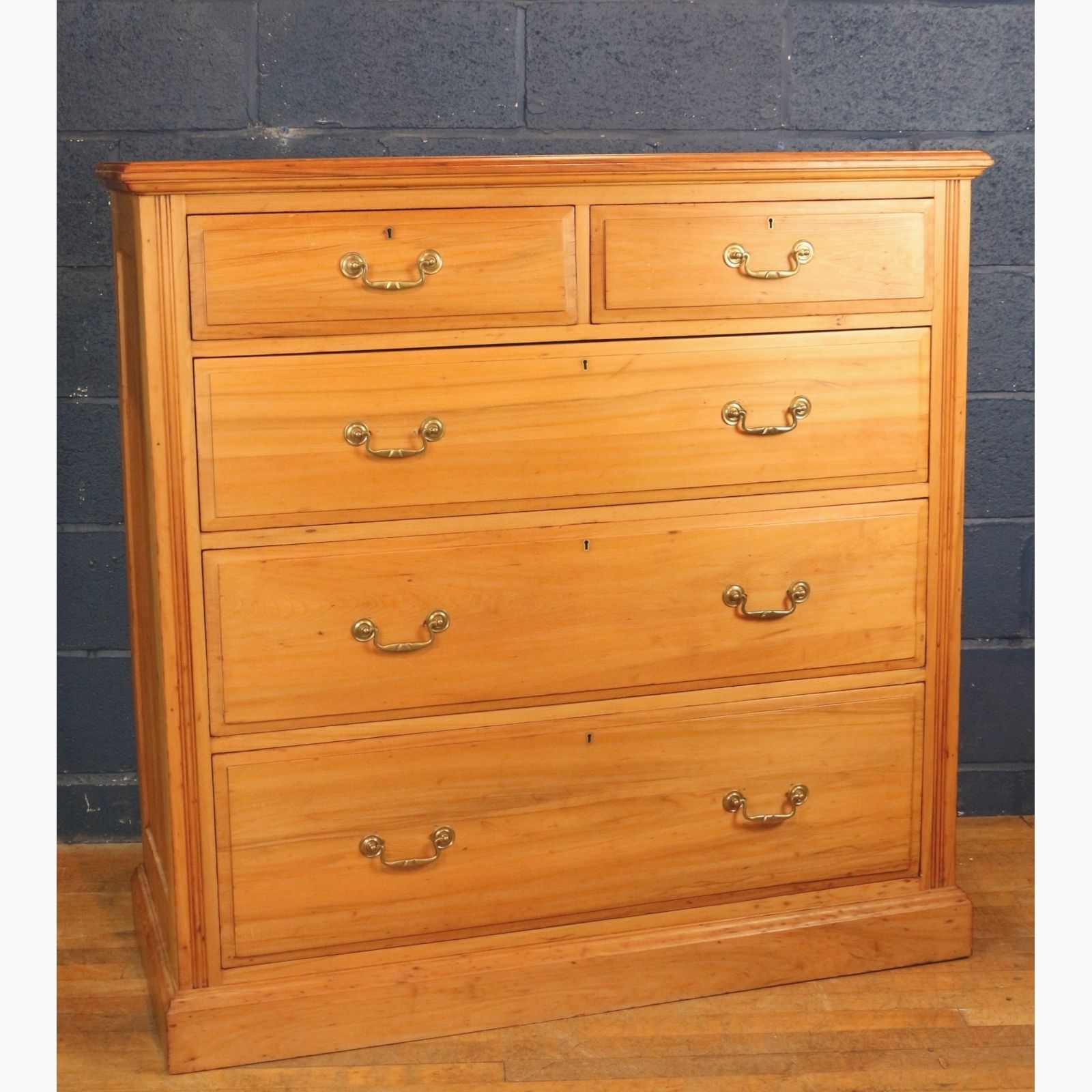 A Victorian Satinwood Two Over Three Chest Of Graduated Drawers