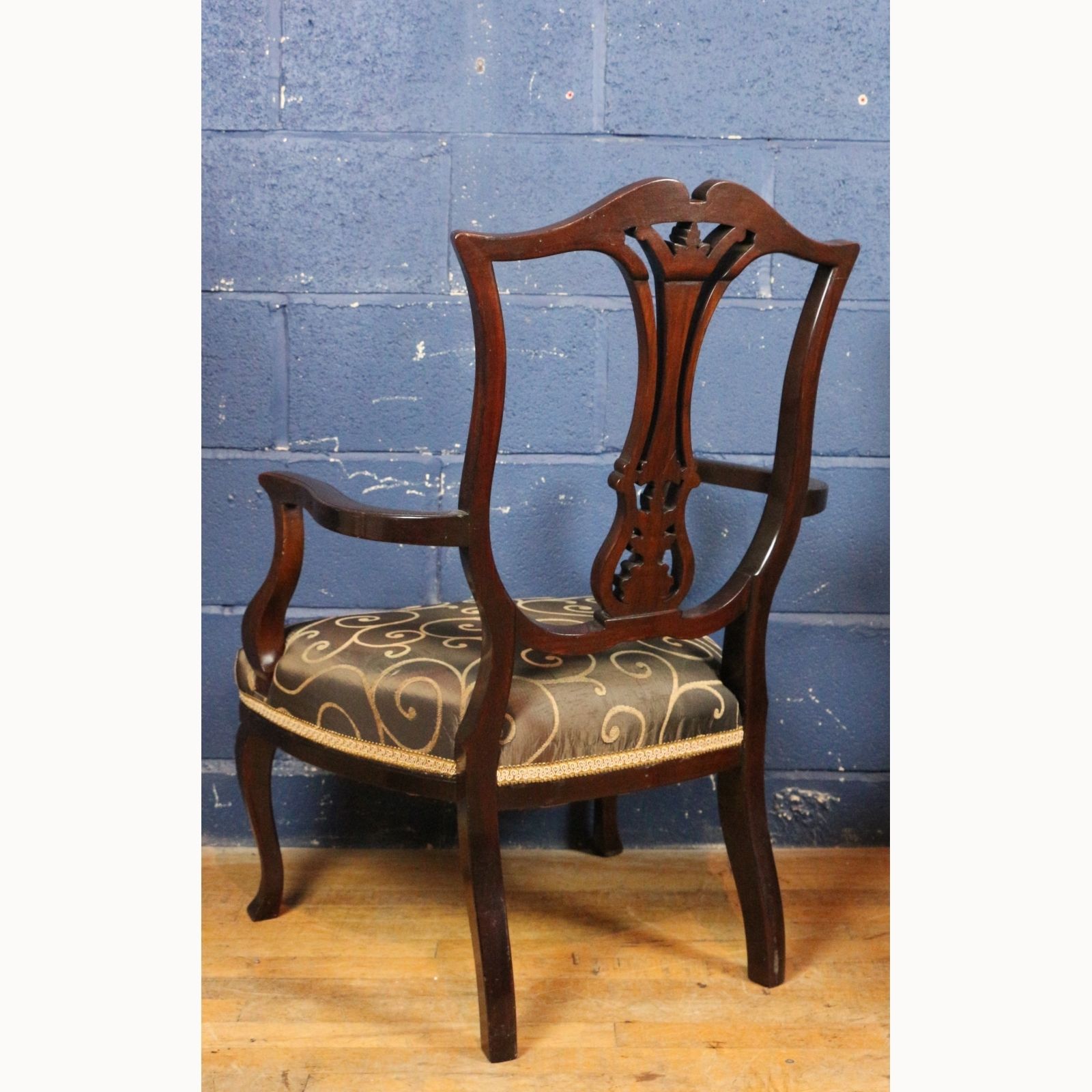 A Pair Of Victorian Carved Mahogany Open Arm Chairs Raised On Cabriole Legs photo buy