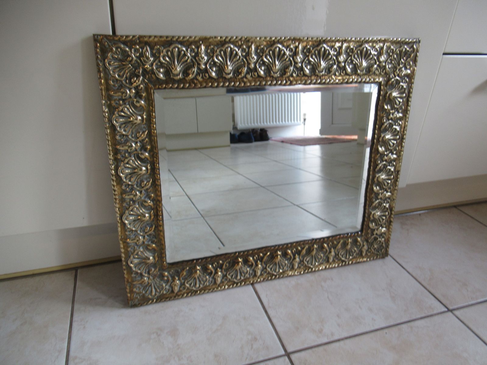 A 1930s Brass Framed  Wall Mirror photo furniture