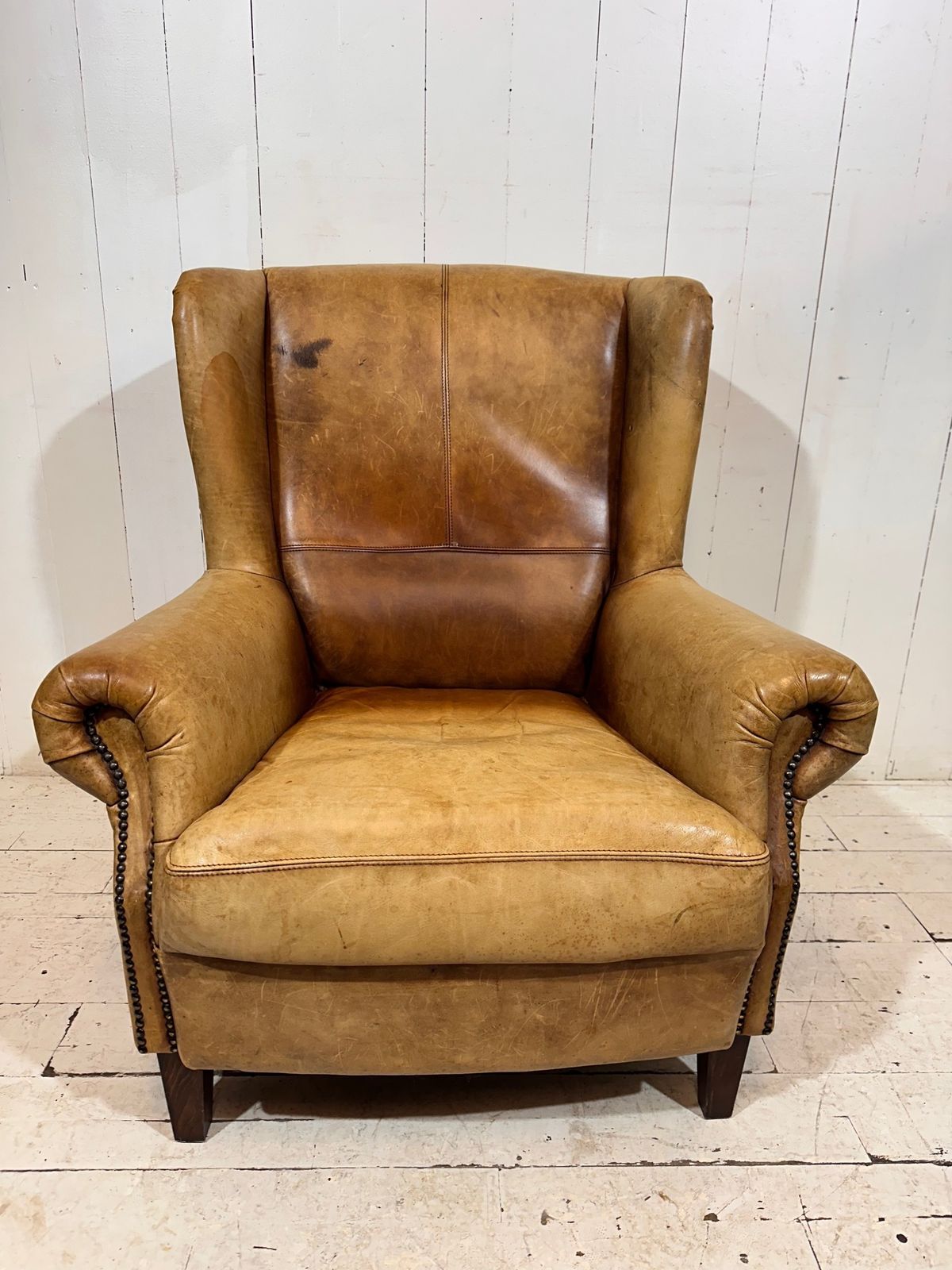 Vintage Hotel Lounge Wingback Armchair In A Distressed Aniline Leather photo for sale