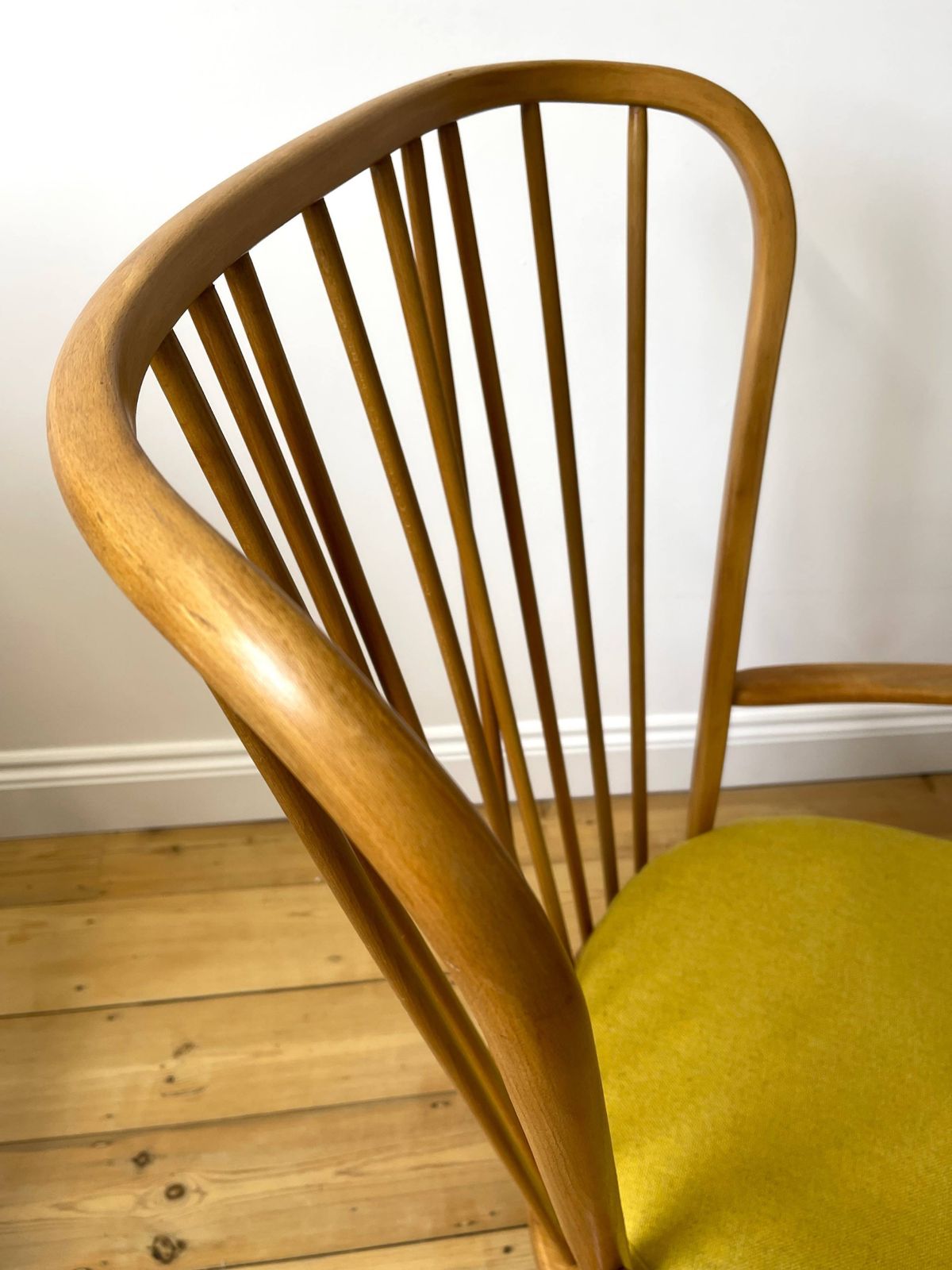 photo furniture Ercol 478 Original Armchair With Yellow Wool Seat.