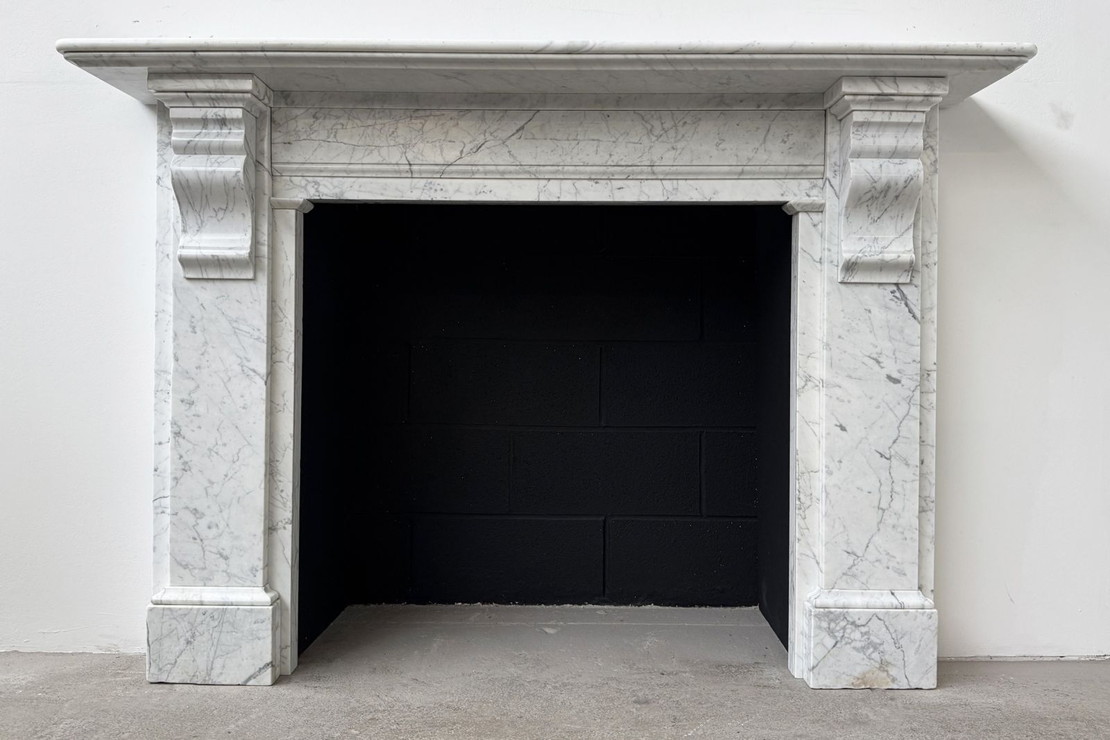 A Substantial Reclaimed Victorian Carrara Marble Fireplace Surround