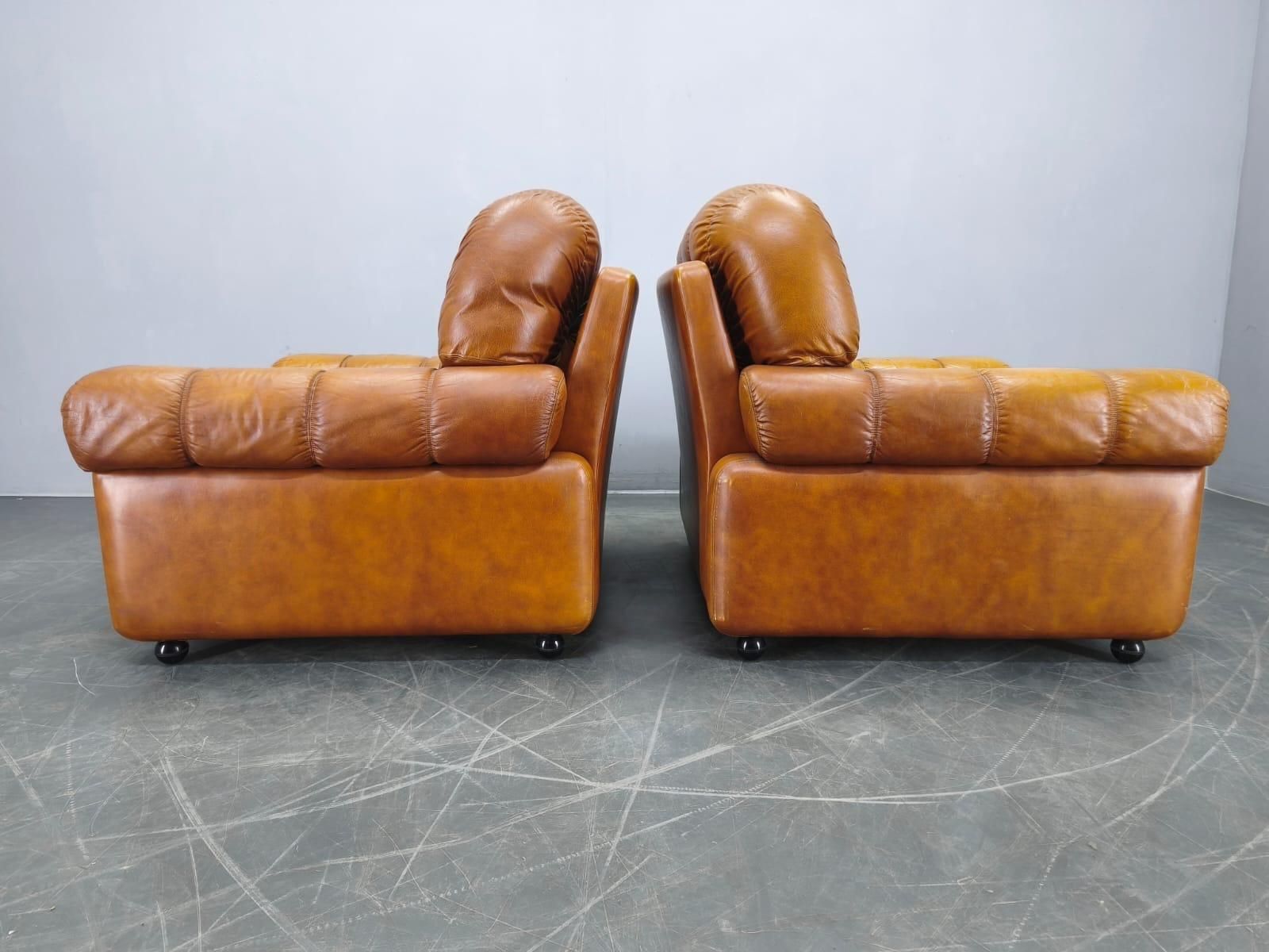 photo furniture Pair Of Italian Mid Century Cognac Leather Lounge Armchairs, 1970s
