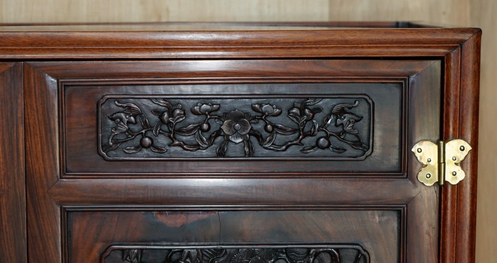 photo furniture A Fine 19th Century Carved Huanghuali Two Door Cabinet On Stand Qing Dynasty