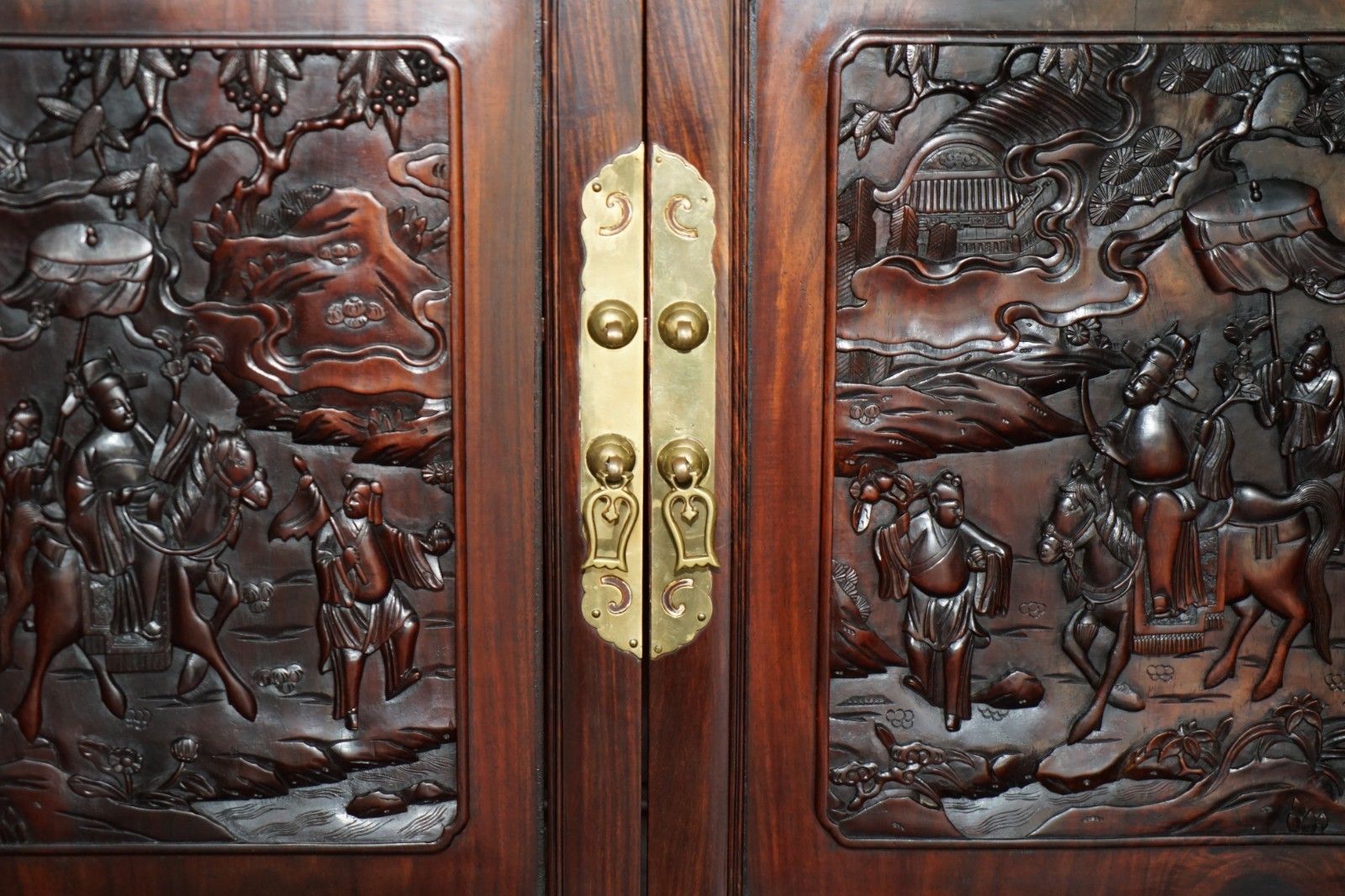 3950.0 A Fine 19th Century Carved Huanghuali Two Door Cabinet On Stand Qing Dynasty photo